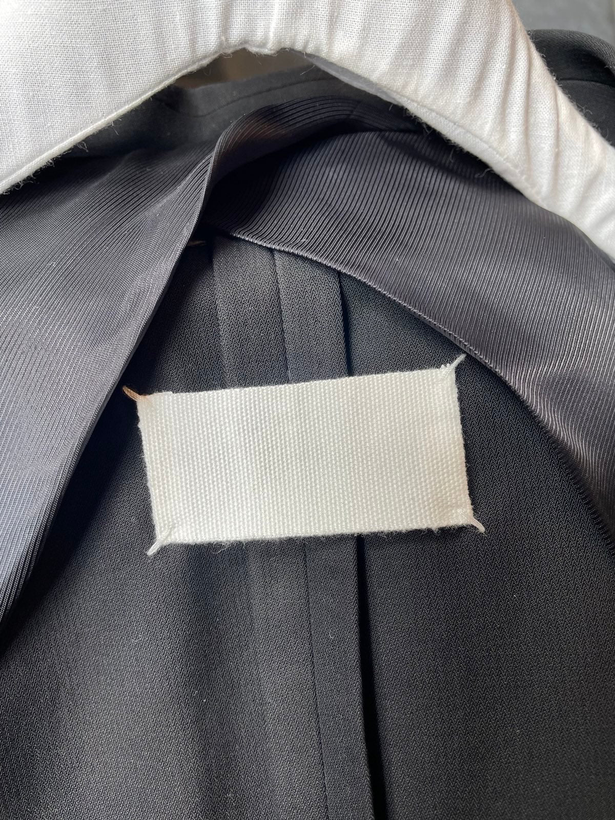 Maison Margiela black deconstructed padded shoulder cigarette jacket