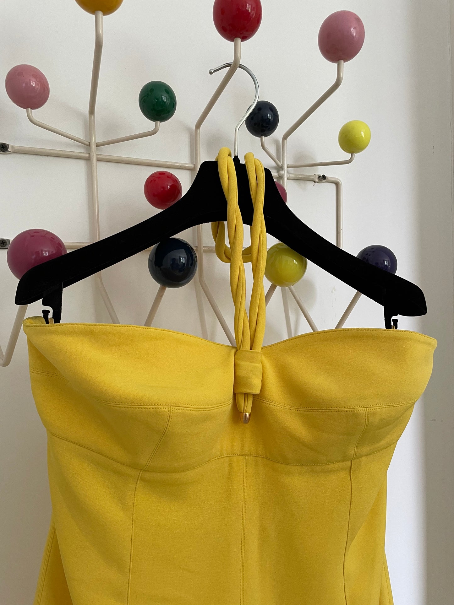 Claude Montana 80's yellow tube dress with swirling tube neck strap.