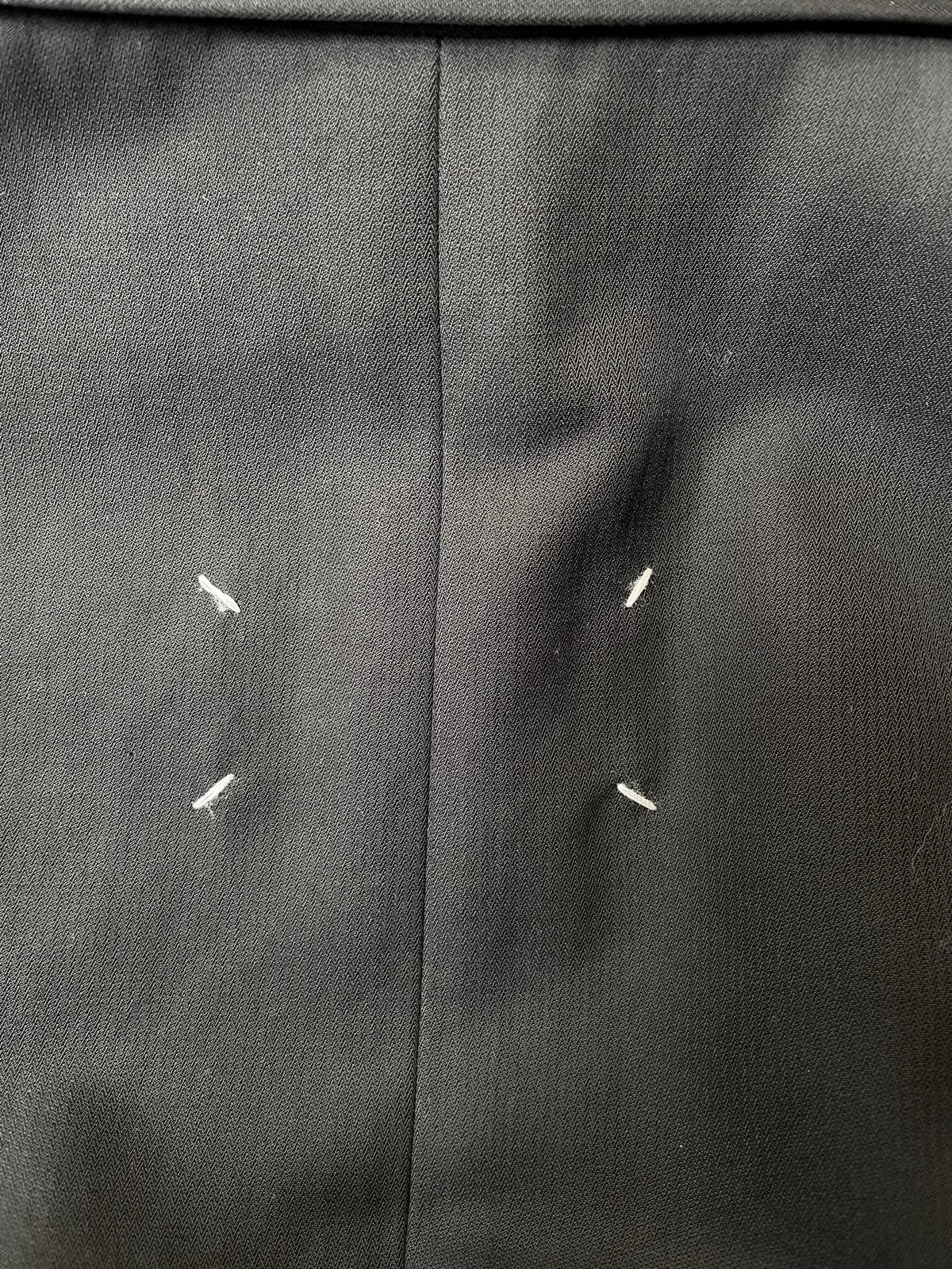 Maison Margiela black deconstructed padded shoulder cigarette jacket