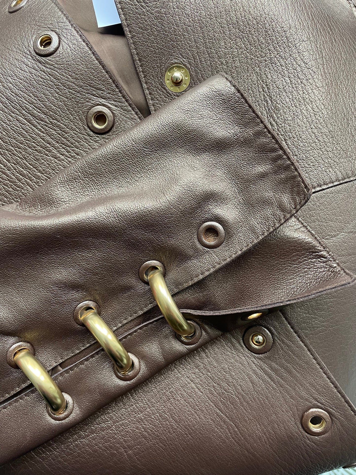 Gianfranco Ferre 80´s bronze leather jacket with golden pierced rings
