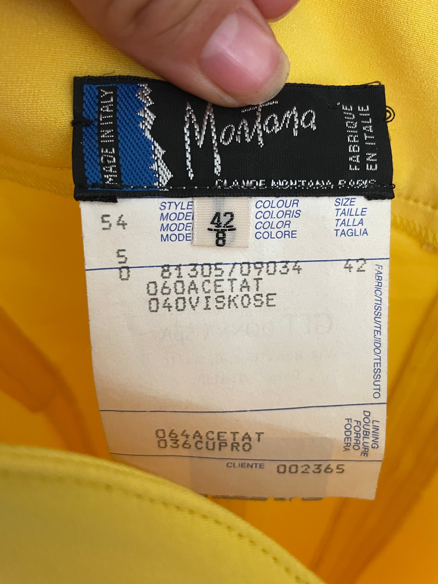 Claude Montana 80's yellow tube dress with swirling tube neck strap.