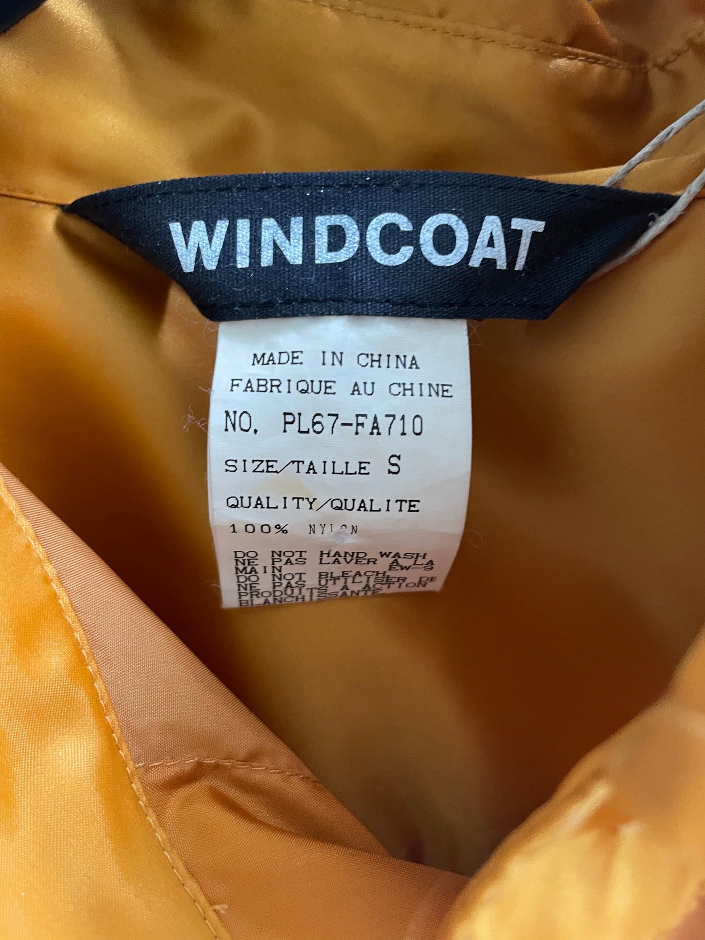 Issey Miyake Windcoat in orange nylon from the 90’s
