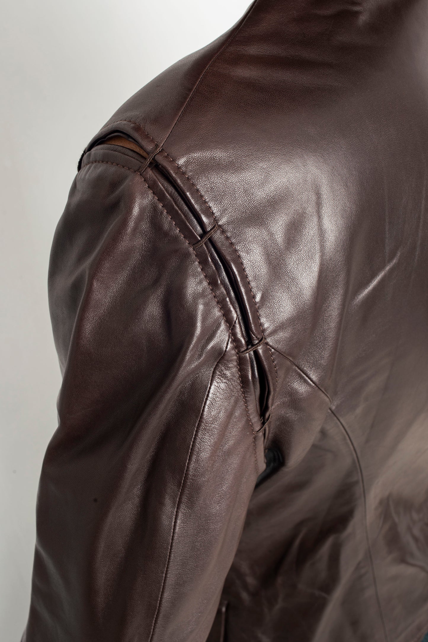 Yves Saint Laurent 2000’s brown leather jacket with stitches detail and ribbon closure