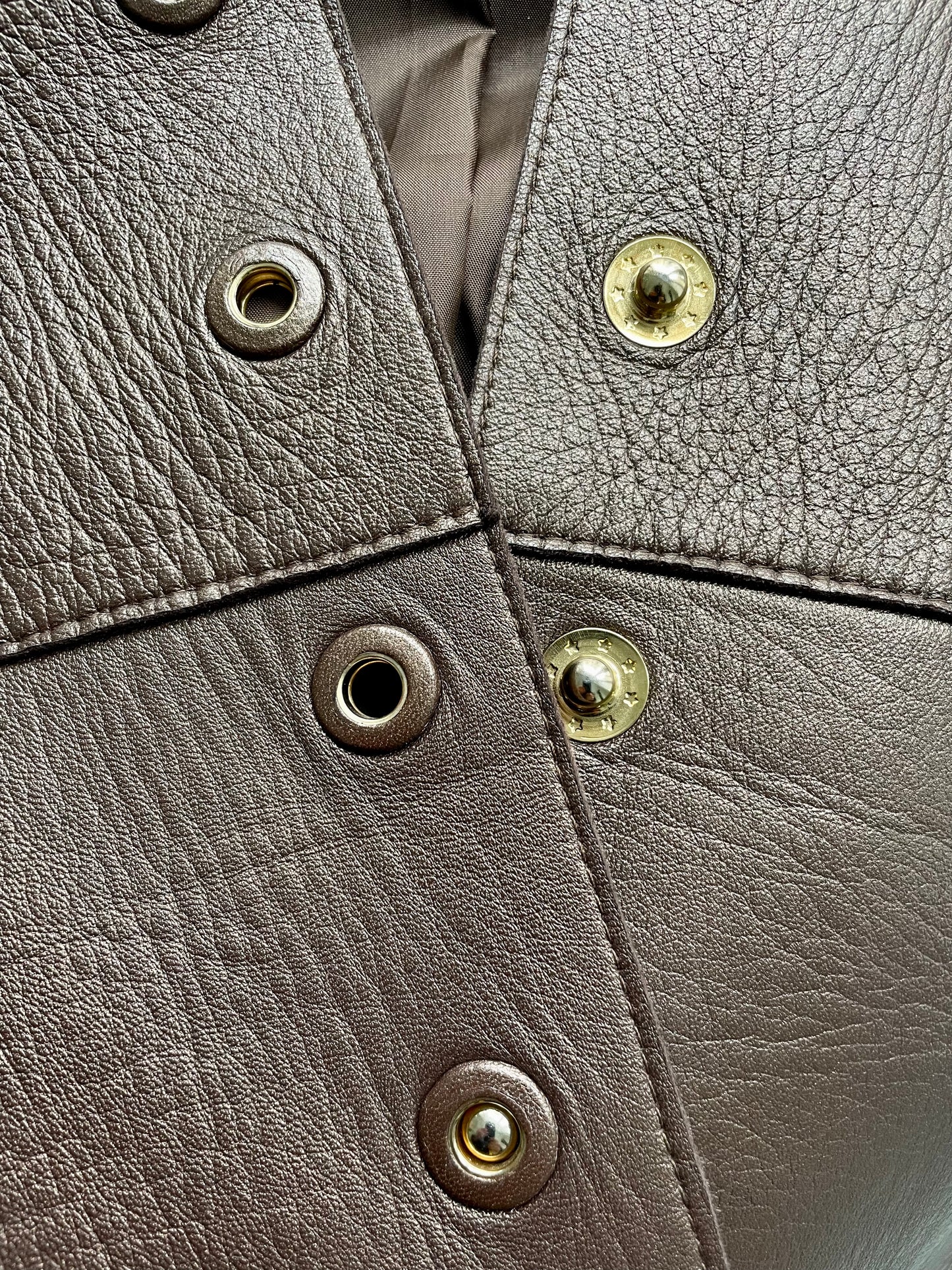 Gianfranco Ferre 80´s bronze leather jacket with golden pierced rings