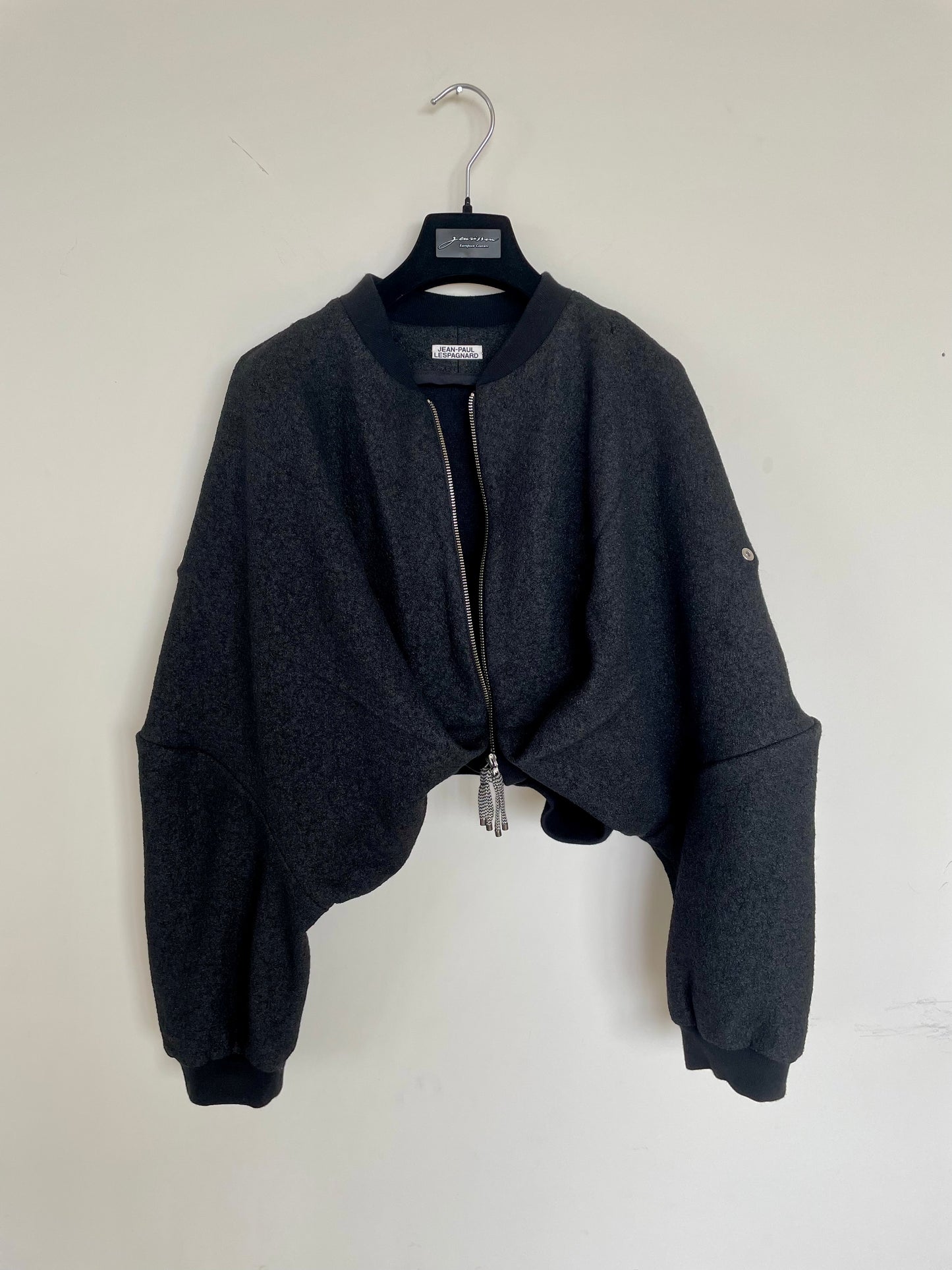 Jean-Paul Lespagnard Cropped transformable black knit bomber jacket with "asphalt" coating