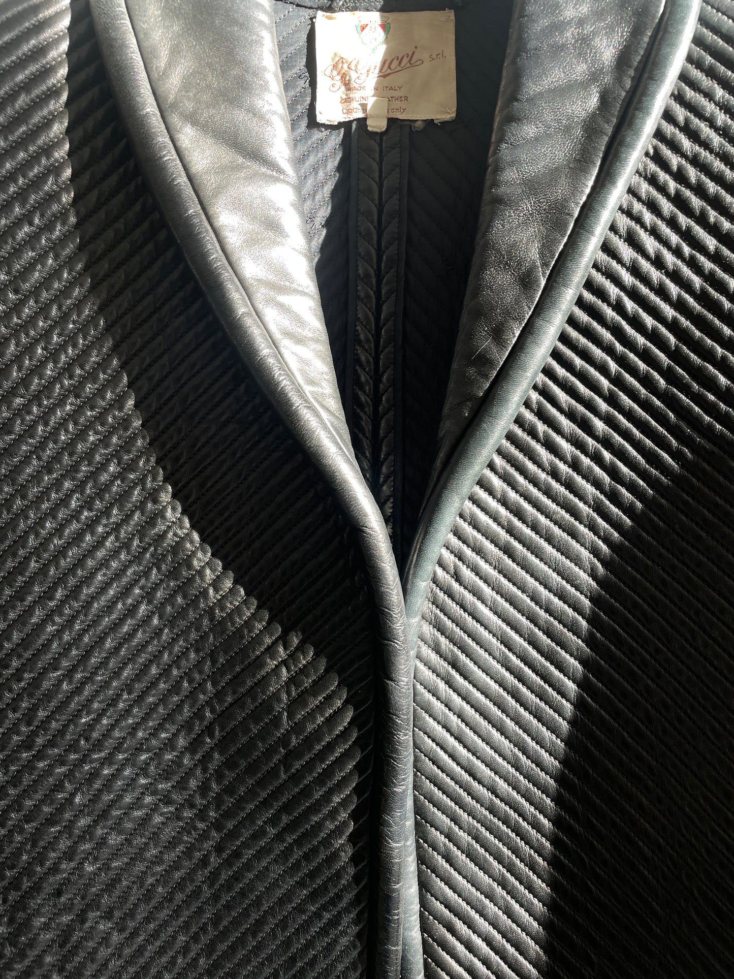 Gucci 80's sculptural quilted leather black jacket with piping trims
