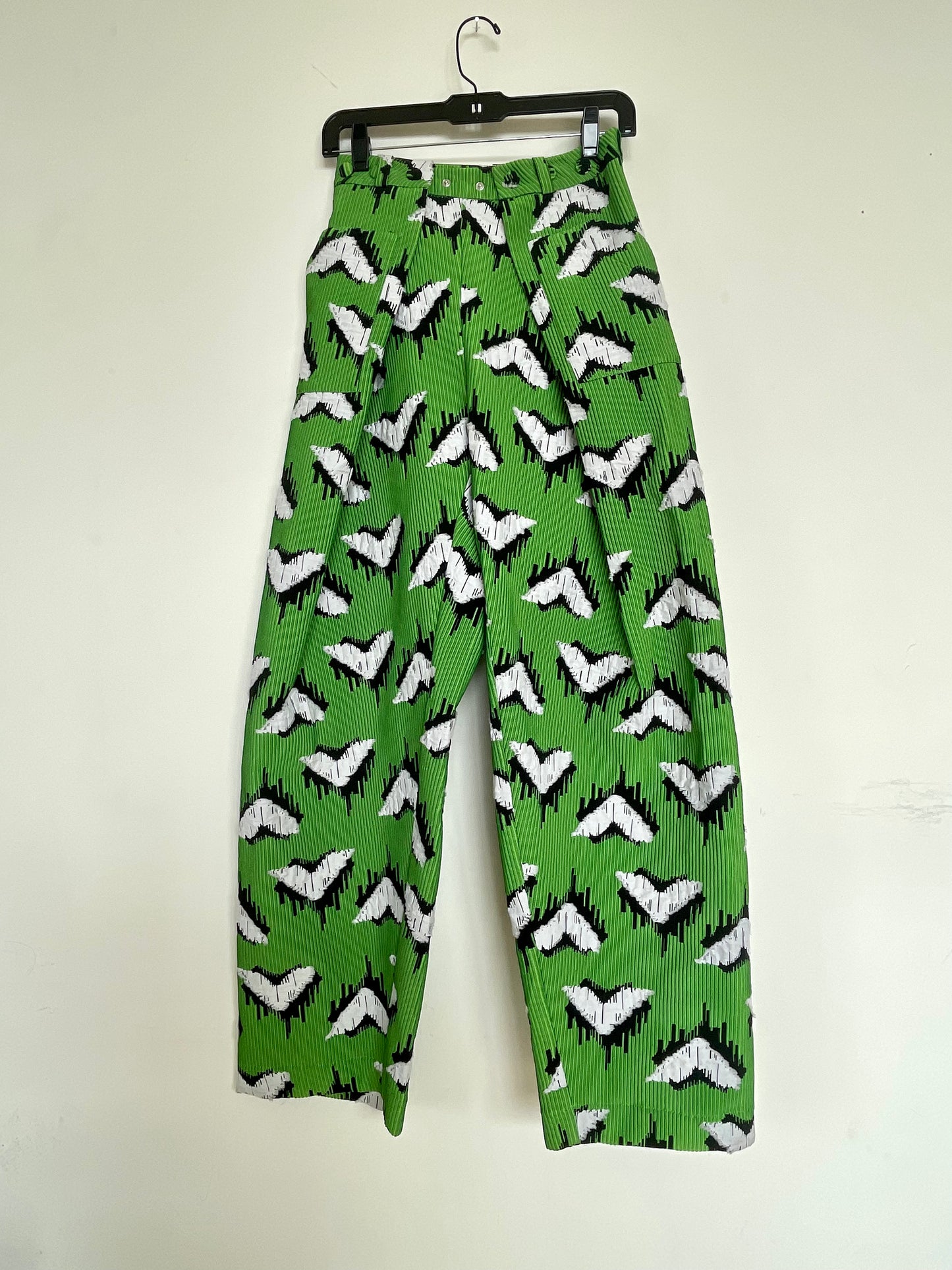 Jean-Paul Lespagnard pleated green, black and white jacquard trousers with "traces of wheels" pattern