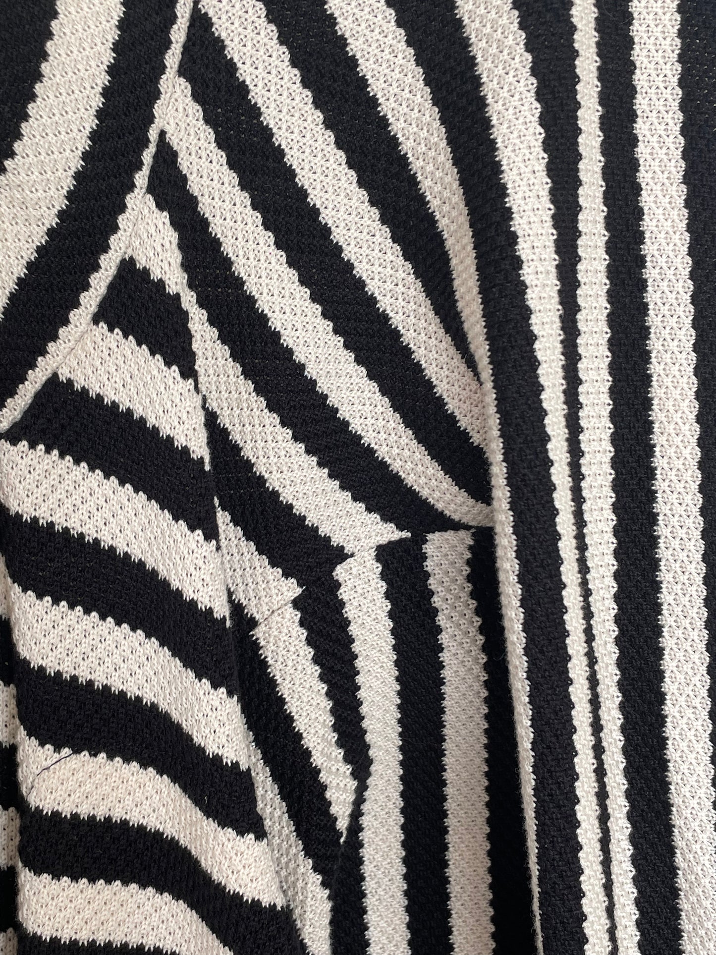 Jean-Paul Lespagnard's black and white striped knit hybrid jumpsuit / trousers