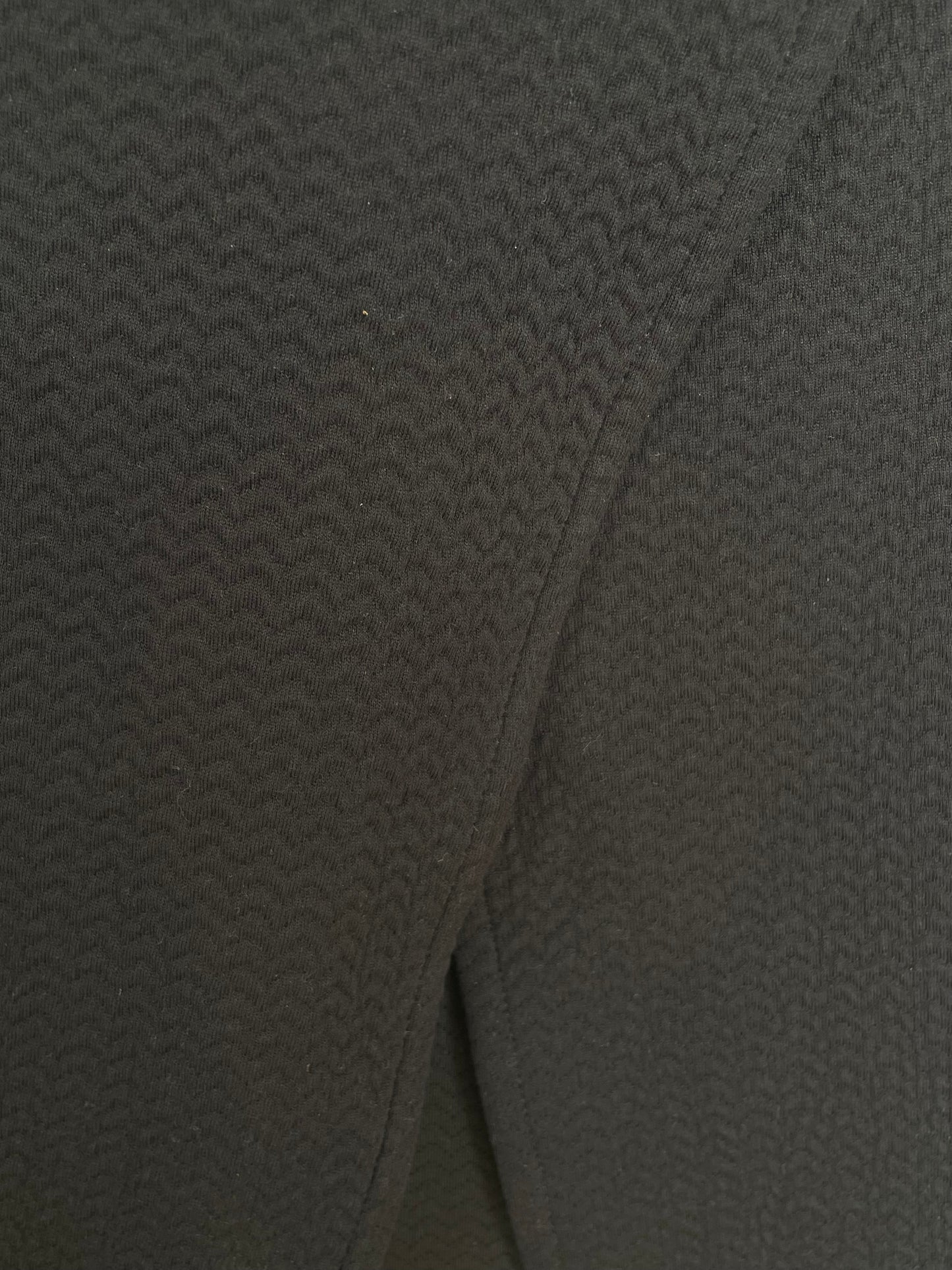 Jean-Paul Lespagnard black knit tunic with high slit and zigzag pattern