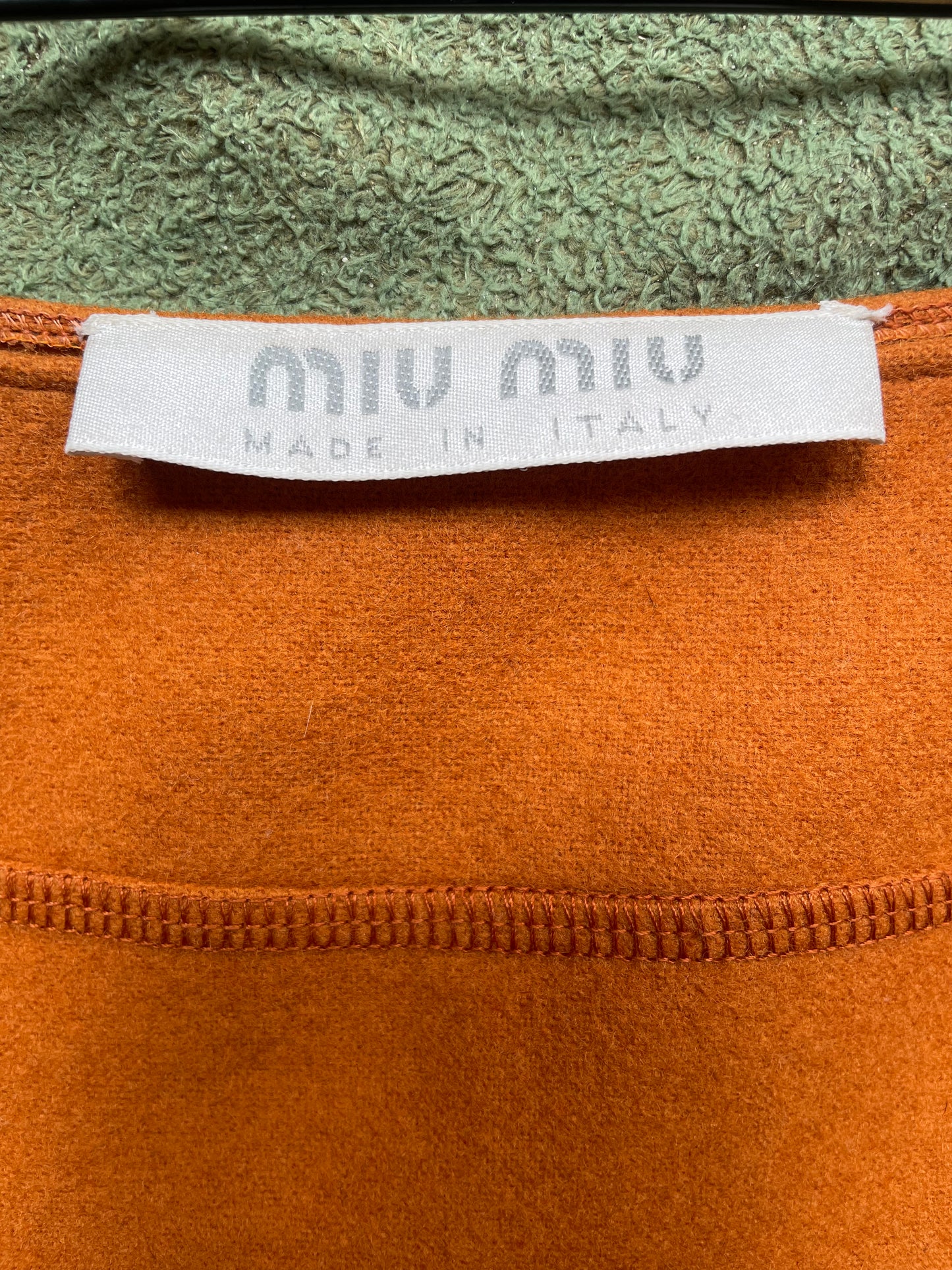 Miu Miu FW 1999 orange miniskirt with stitched in fanny pack