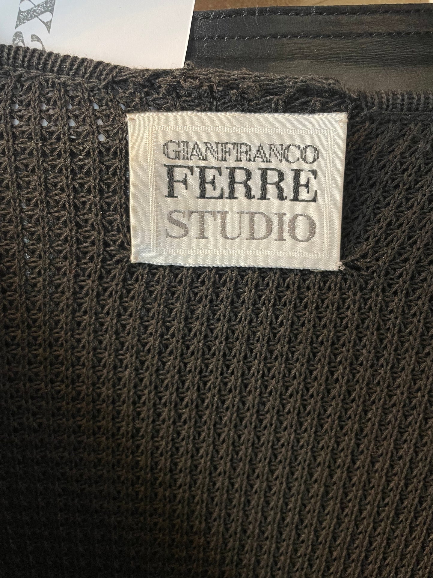 Gianfranco Ferre 90's leather jacket with knit sleeves and back
