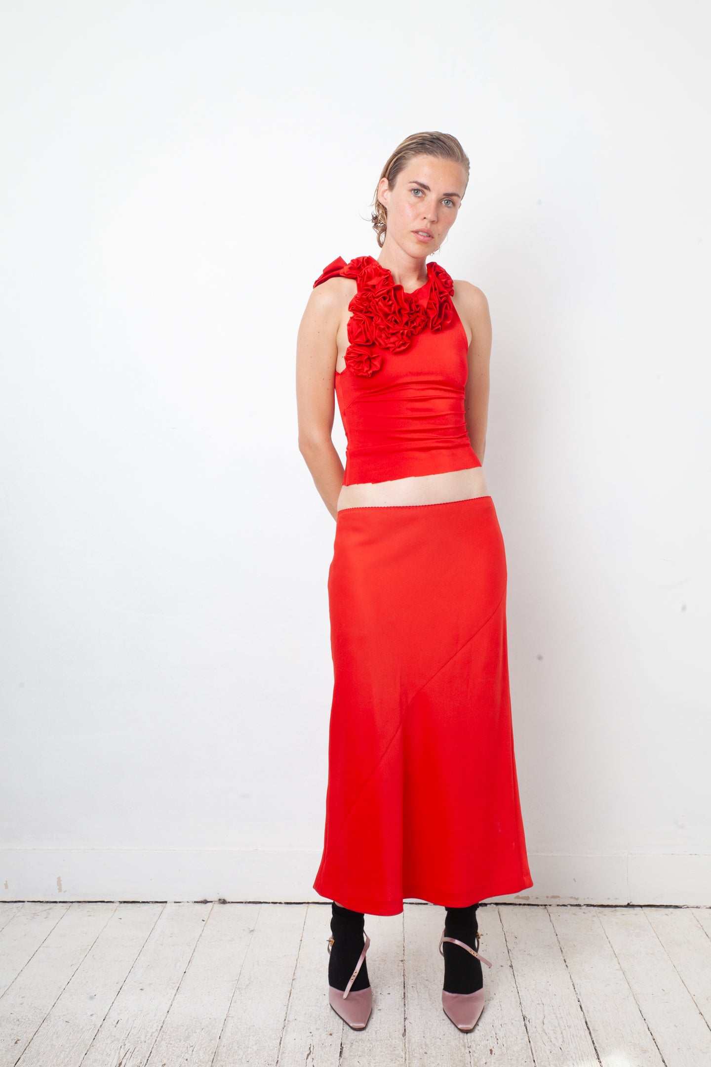 IRIÉ 2000's bright red stretchy top with sculptural 3D roses collar
