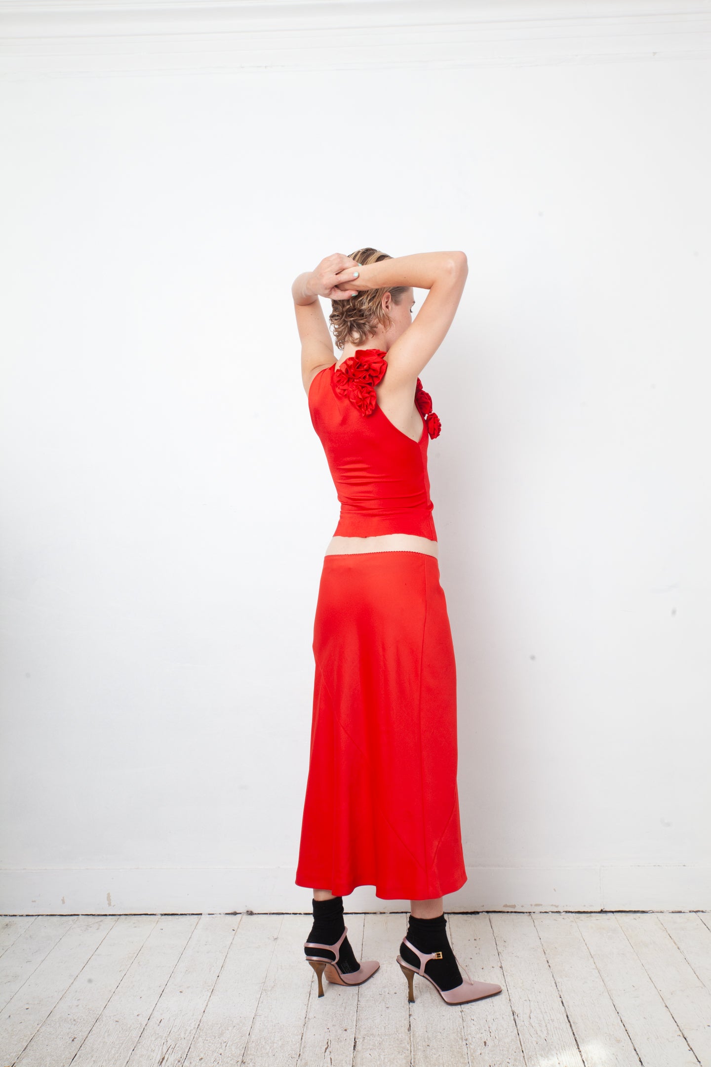IRIÉ 2000's bright red stretchy top with sculptural 3D roses collar