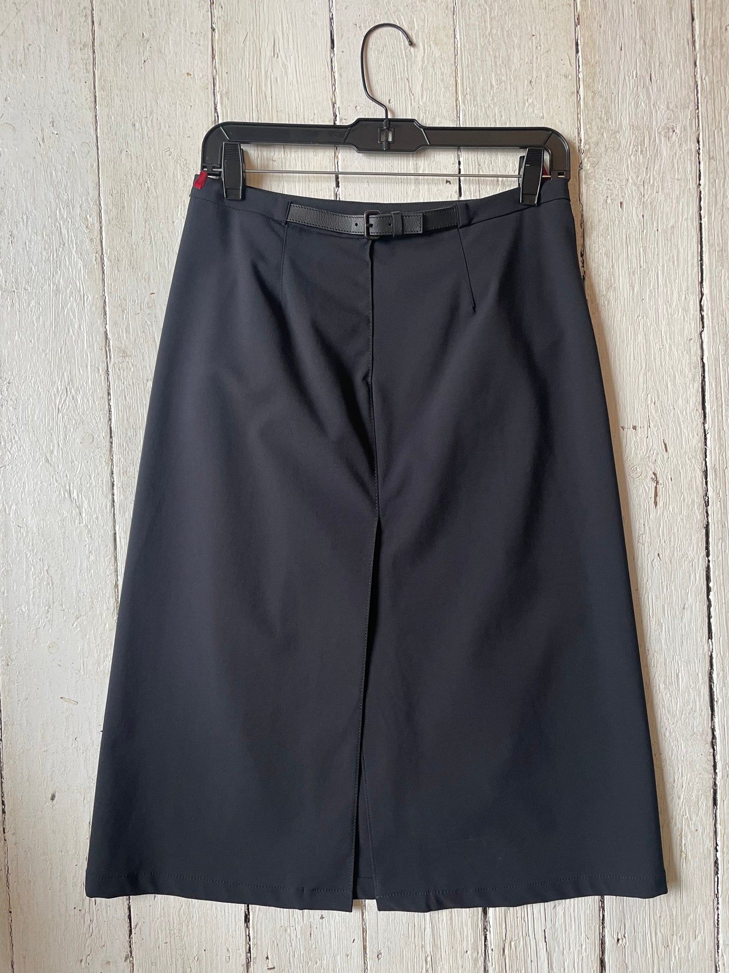 Prada 2000's black nylon midi skirt with velcro front pockets and leather belt detail