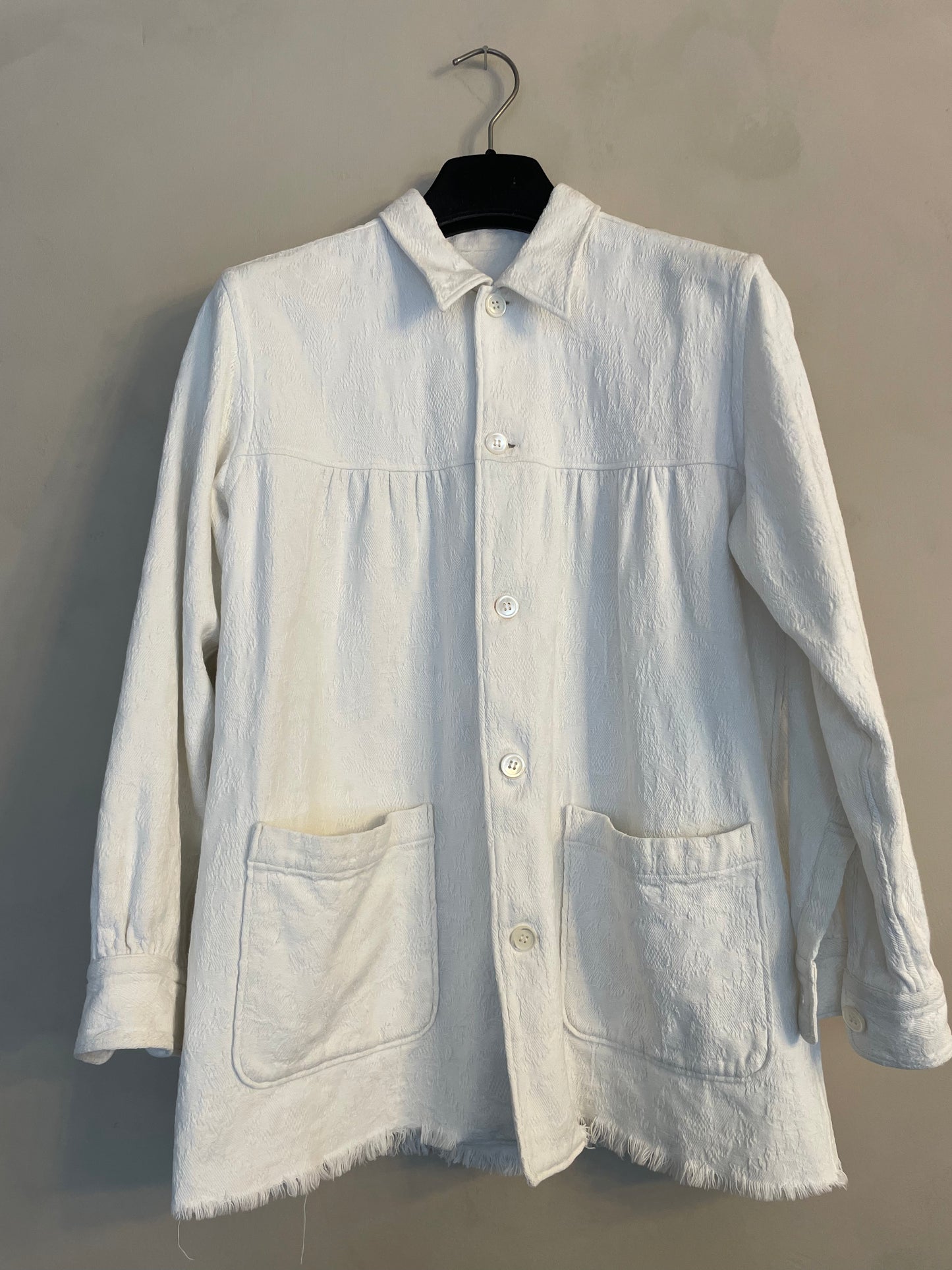 Comme des Garçons 2000's white jacquard worker's jacket with distressed hems