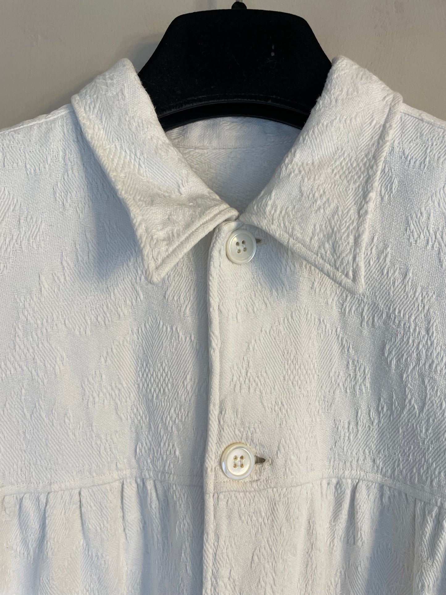 Comme des Garçons 2000's white jacquard worker's jacket with distressed hems
