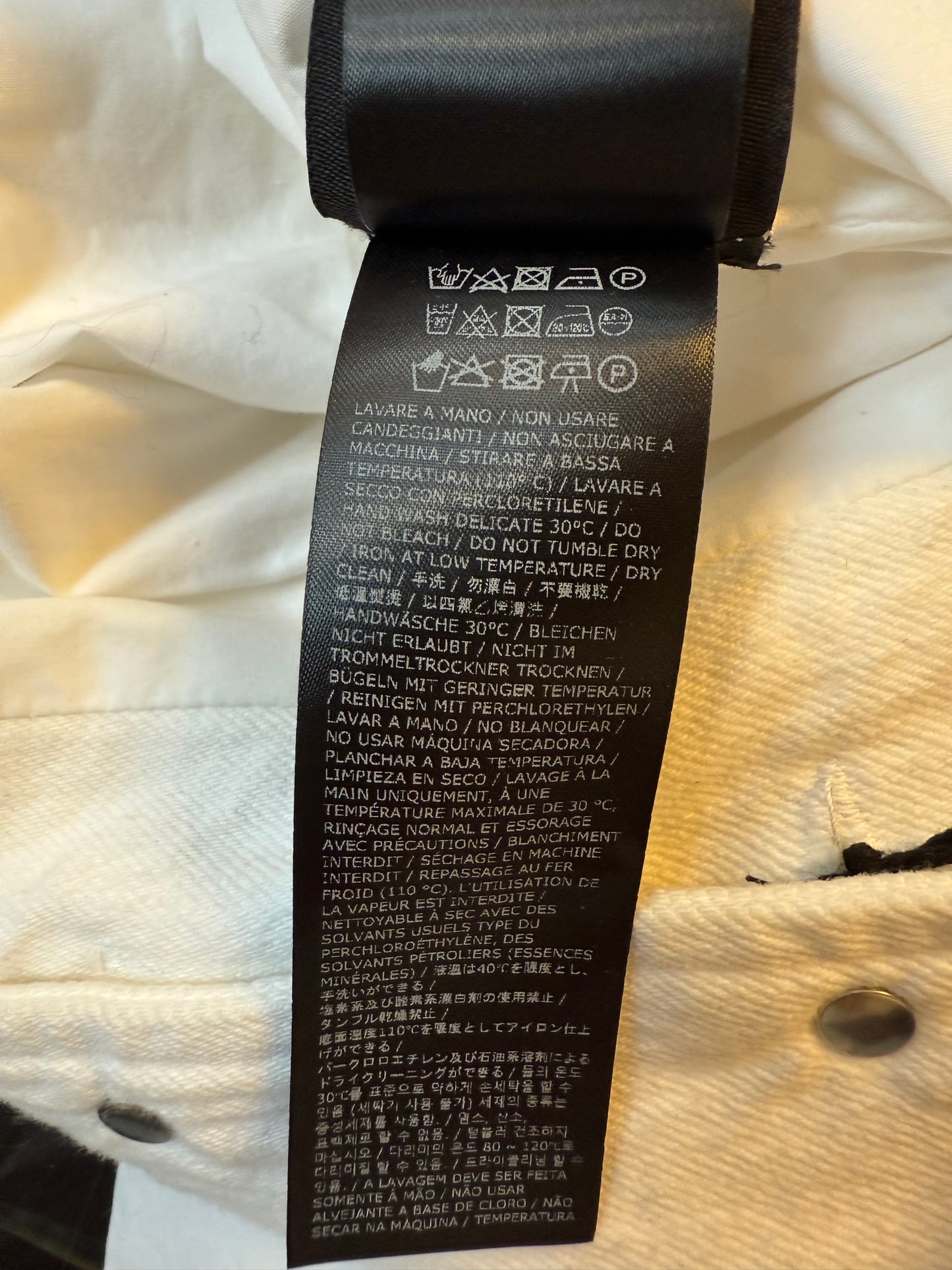 Ann Demeulemeester SS 2022 white denim oversized gilet with back slit and belts