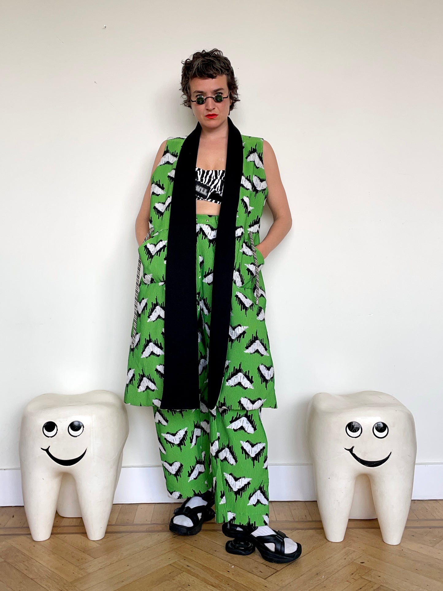 Jean-Paul Lespagnard pleated green, black and white jacquard trousers with "traces of wheels" pattern