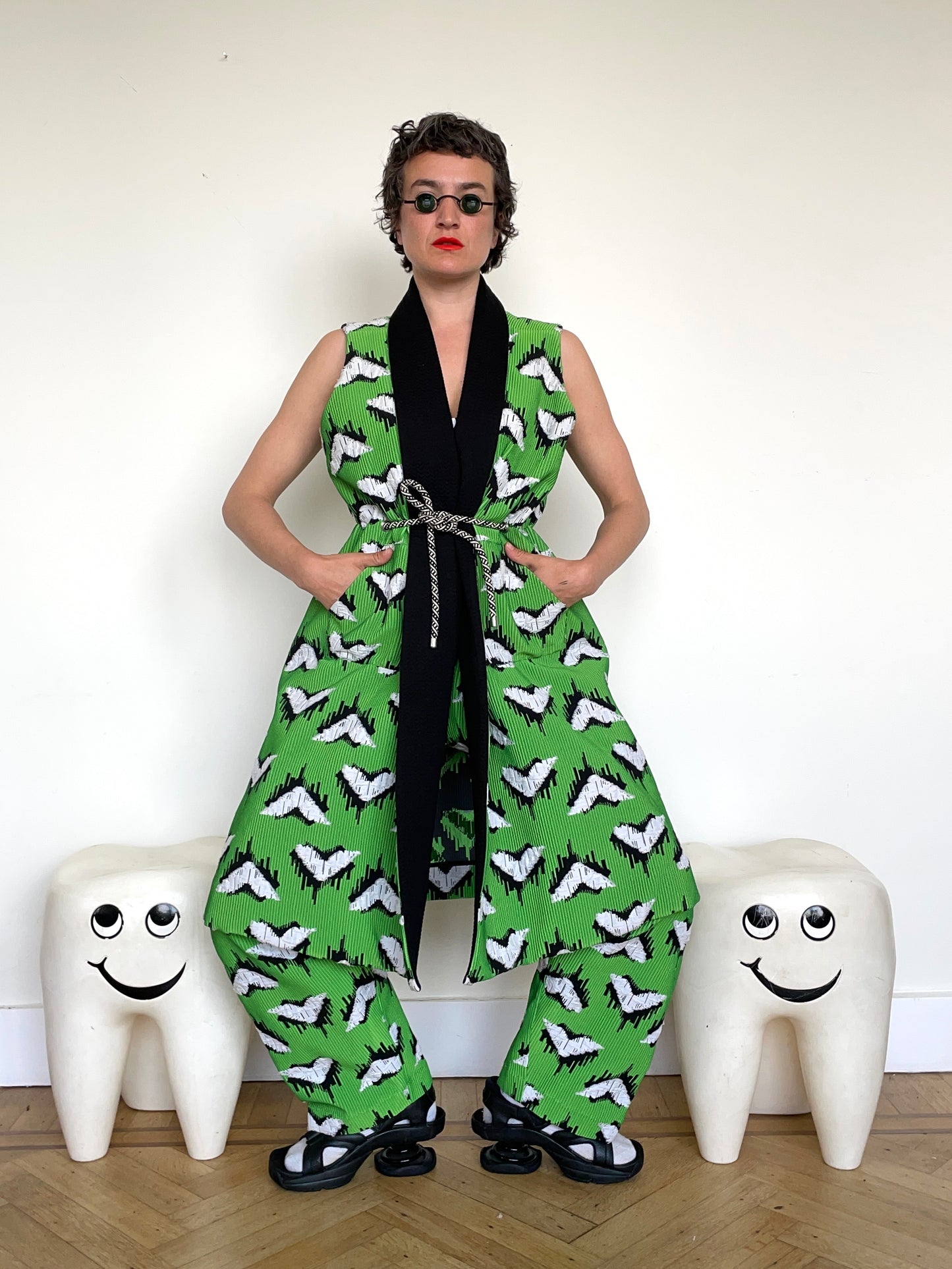 Jean-Paul Lespagnard pleated green, black and white jacquard trousers with "traces of wheels" pattern