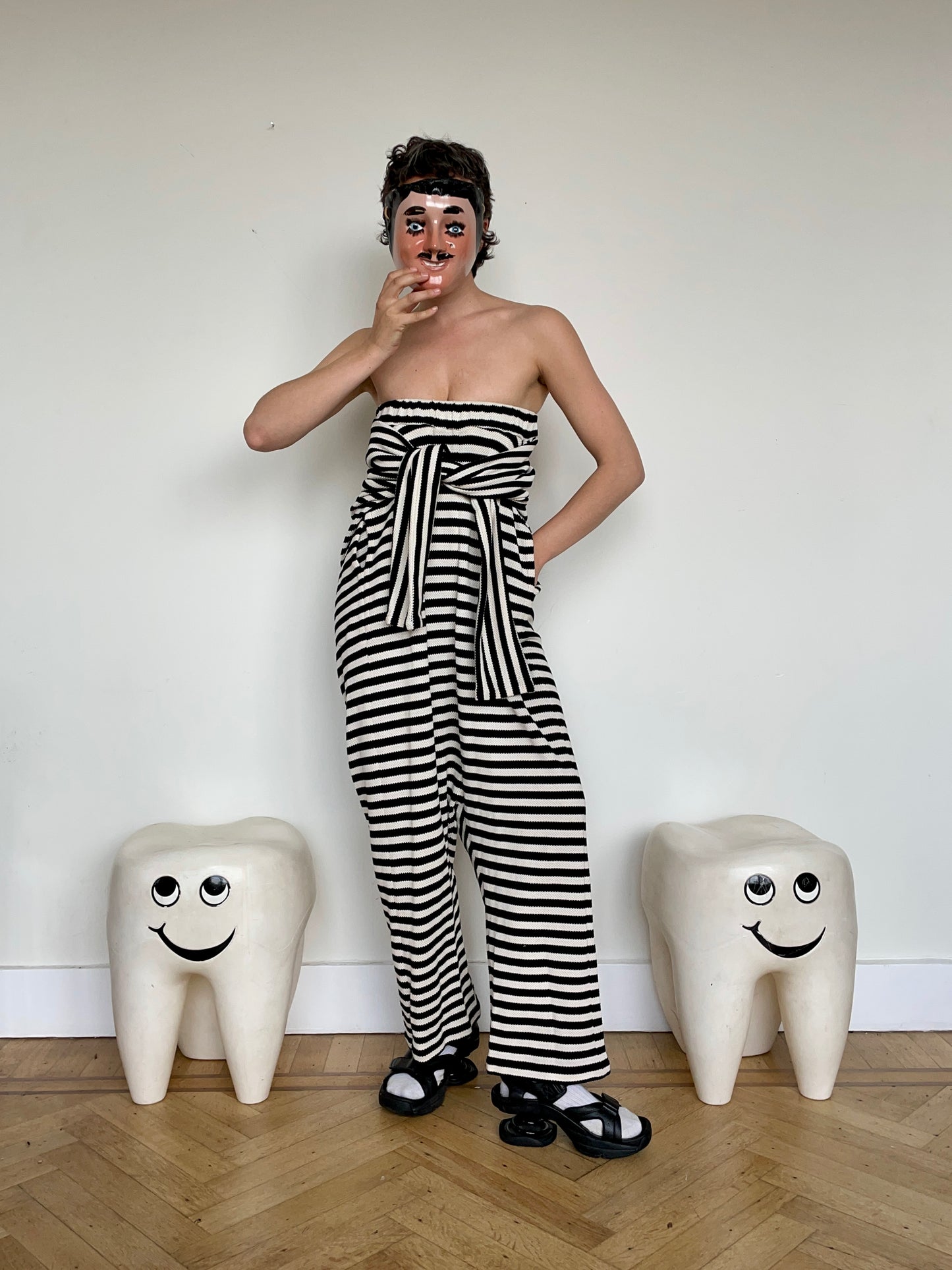 Jean-Paul Lespagnard's black and white striped knit hybrid jumpsuit / trousers
