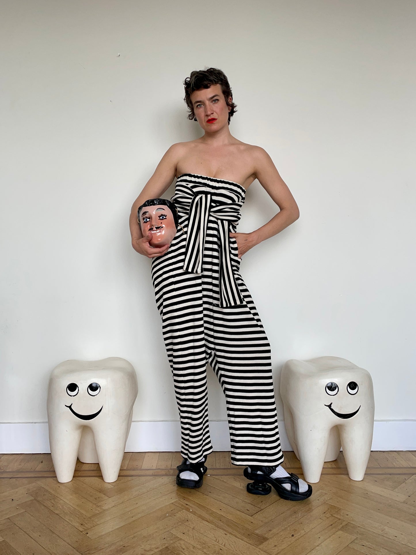 Jean-Paul Lespagnard's black and white striped knit hybrid jumpsuit / trousers