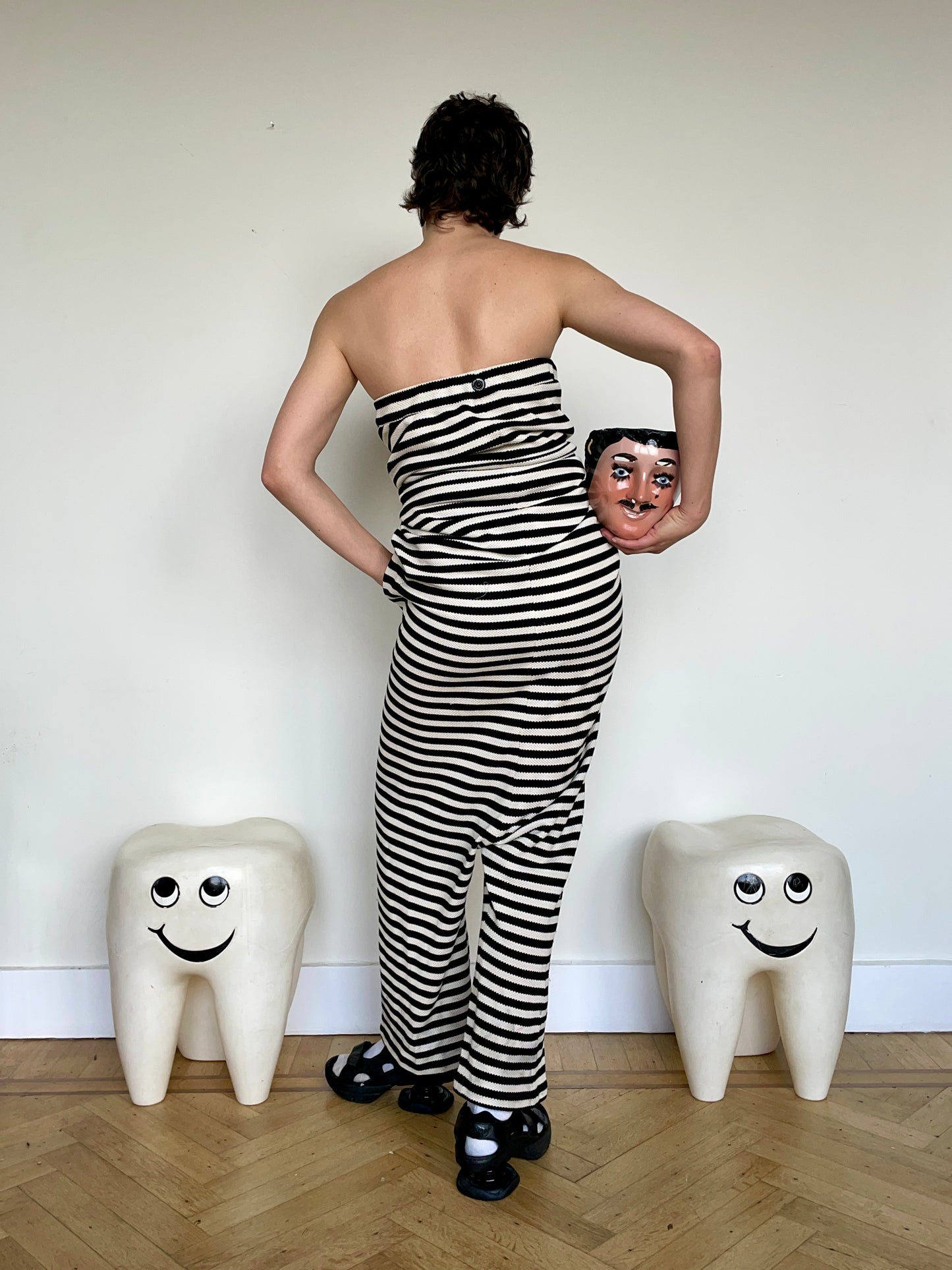 Jean-Paul Lespagnard's black and white striped knit hybrid jumpsuit / trousers