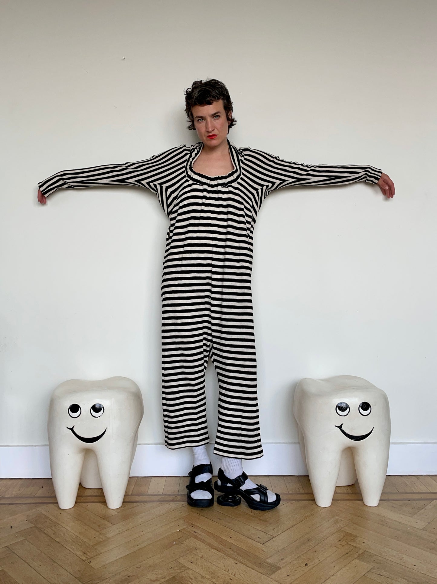 Jean-Paul Lespagnard's black and white striped knit hybrid jumpsuit / trousers