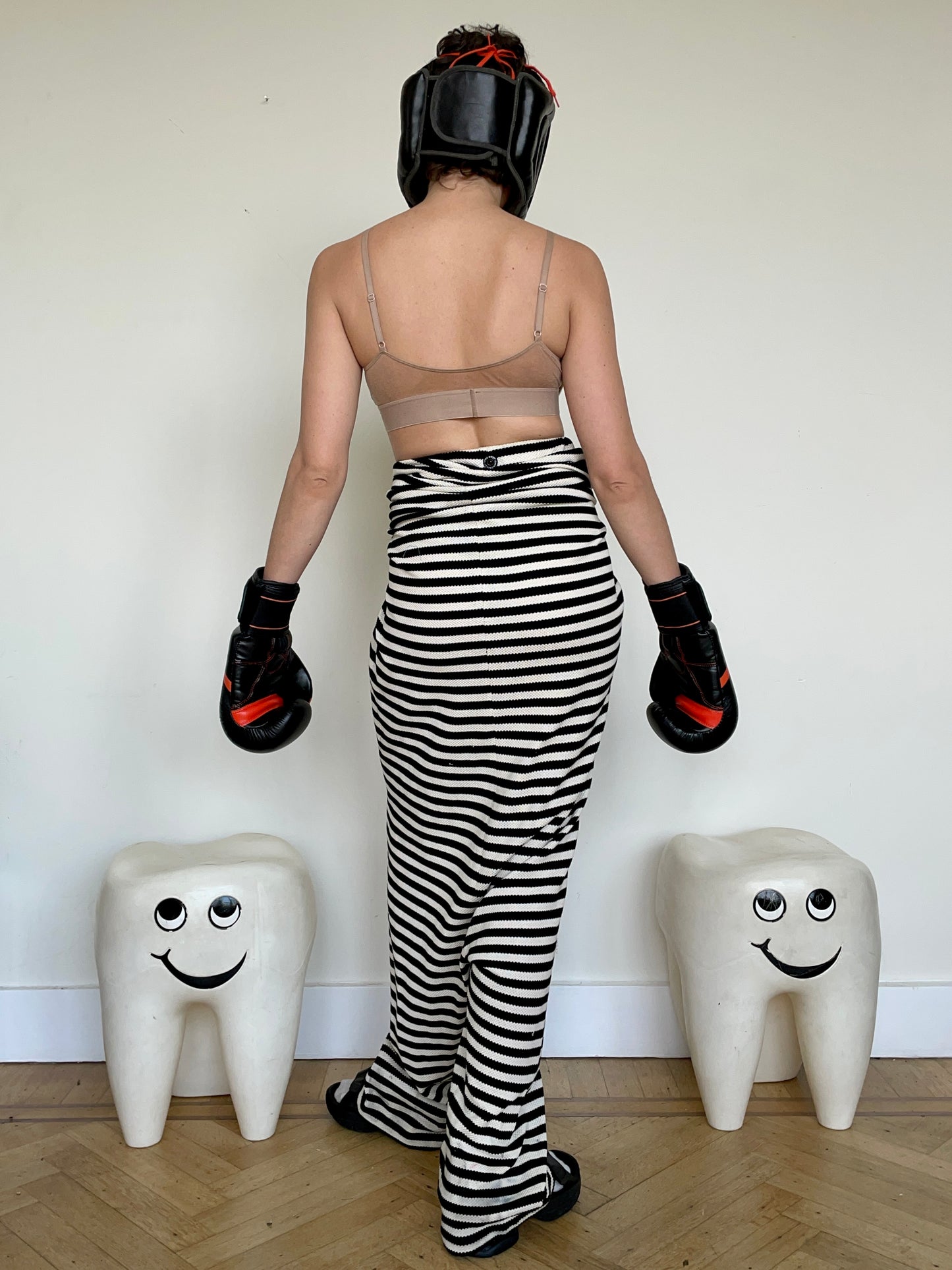 Jean-Paul Lespagnard's black and white striped knit hybrid jumpsuit / trousers