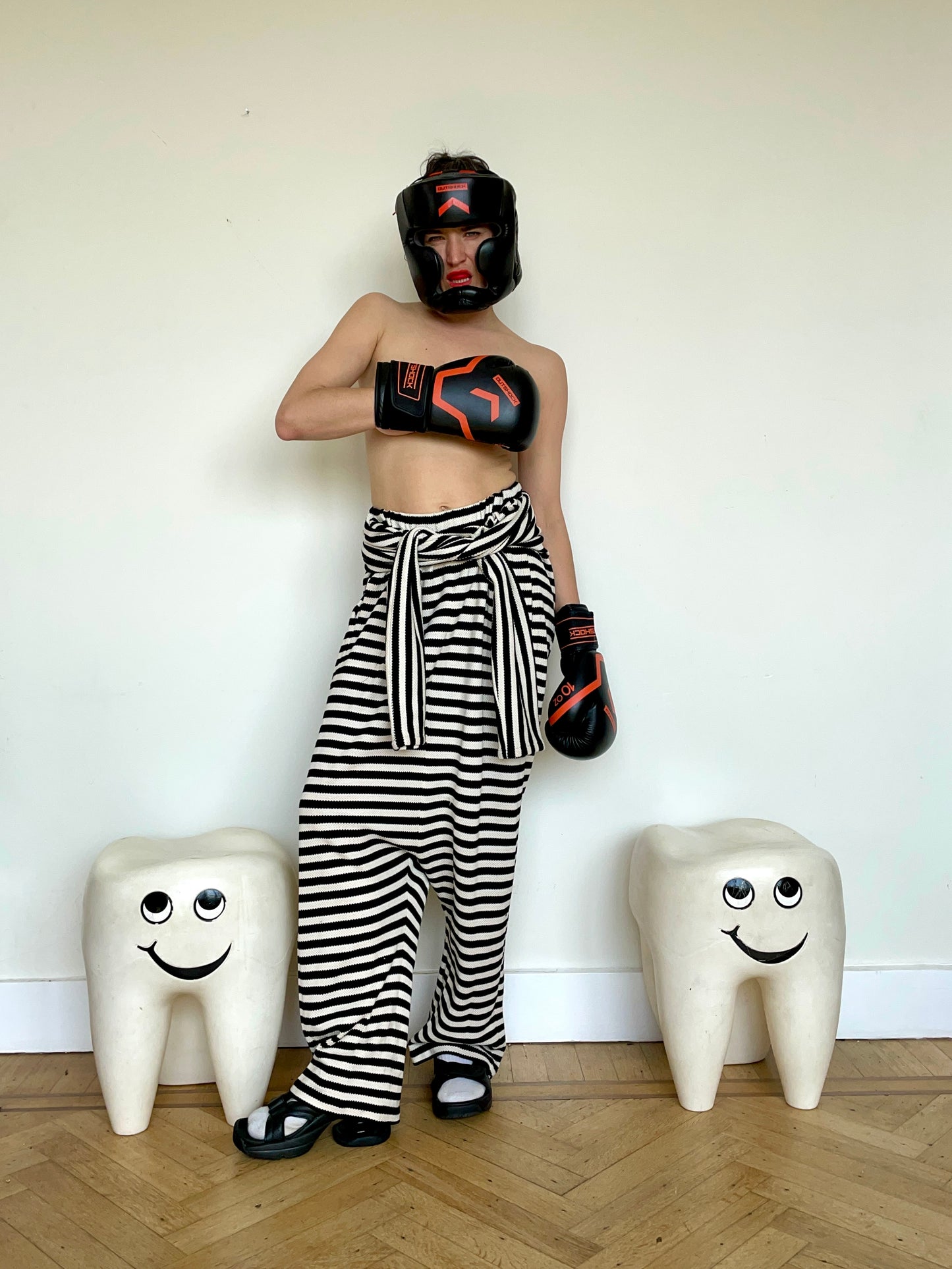 Jean-Paul Lespagnard's black and white striped knit hybrid jumpsuit / trousers