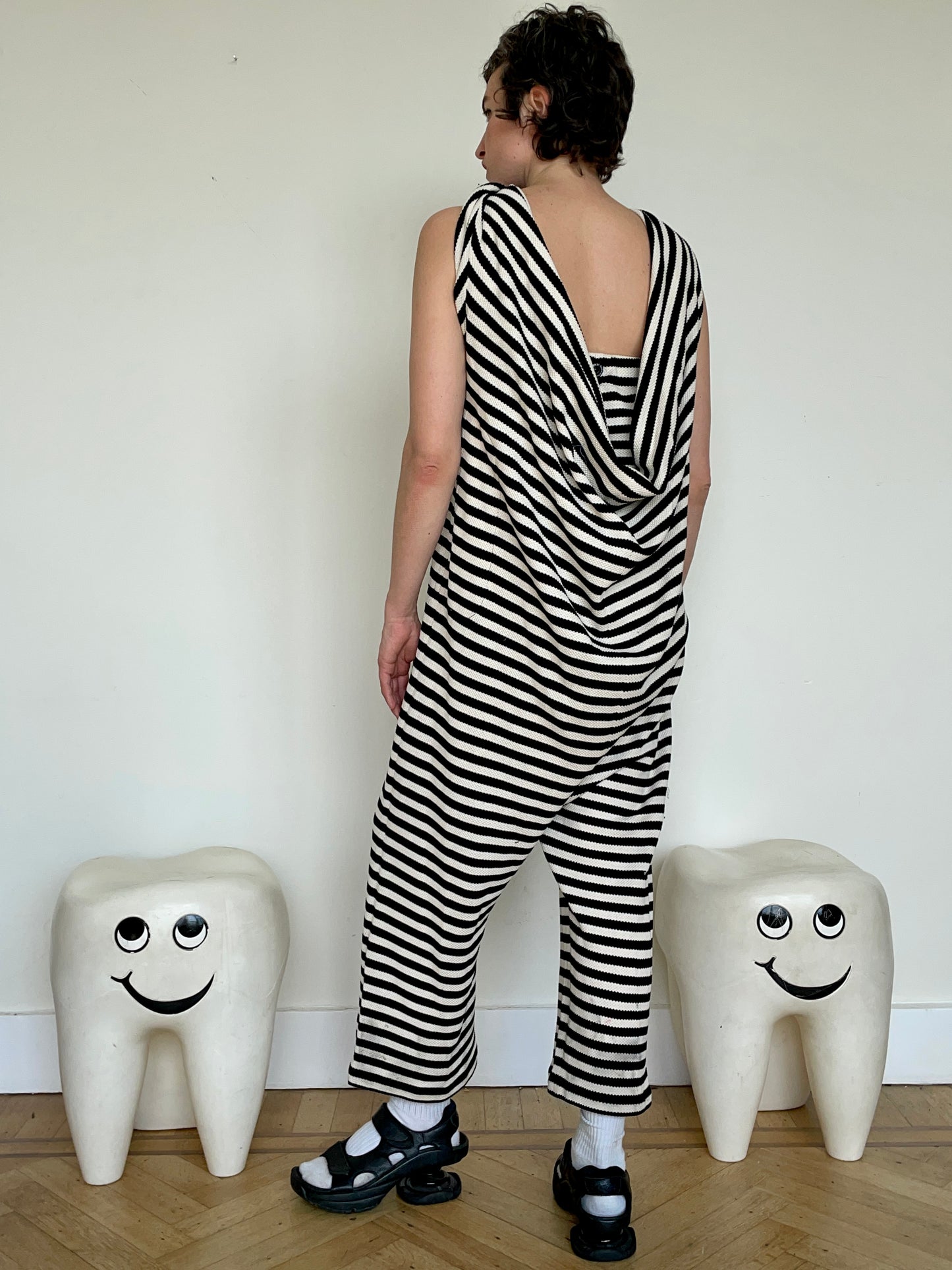 Jean-Paul Lespagnard's black and white striped knit hybrid jumpsuit / trousers