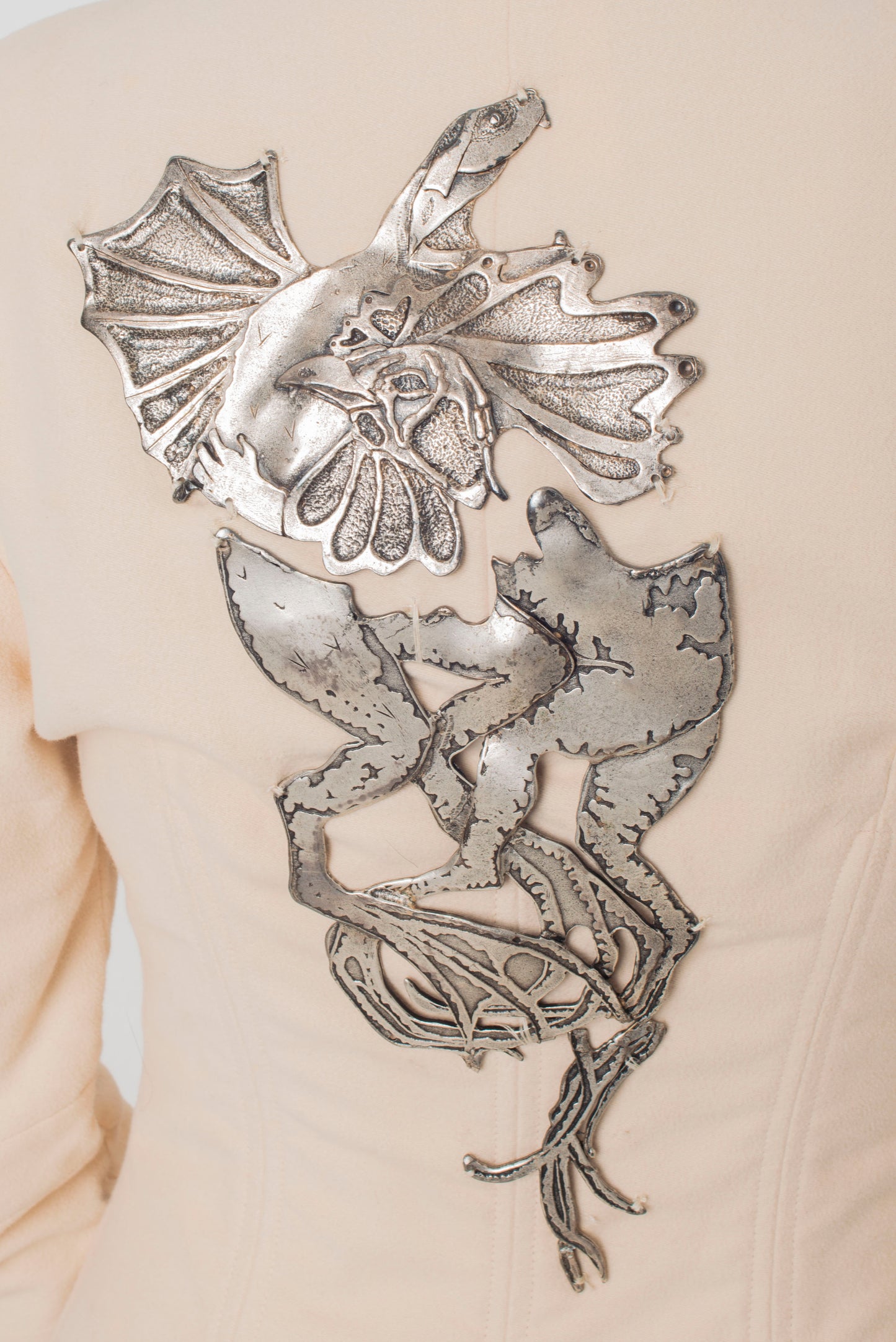 Chloé FW 2001 beige coat with integrated corset and metallic rooster / dragon plate