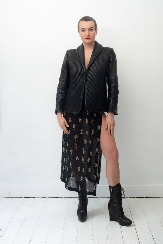 Gucci 80's sculptural quilted leather black jacket with piping trims