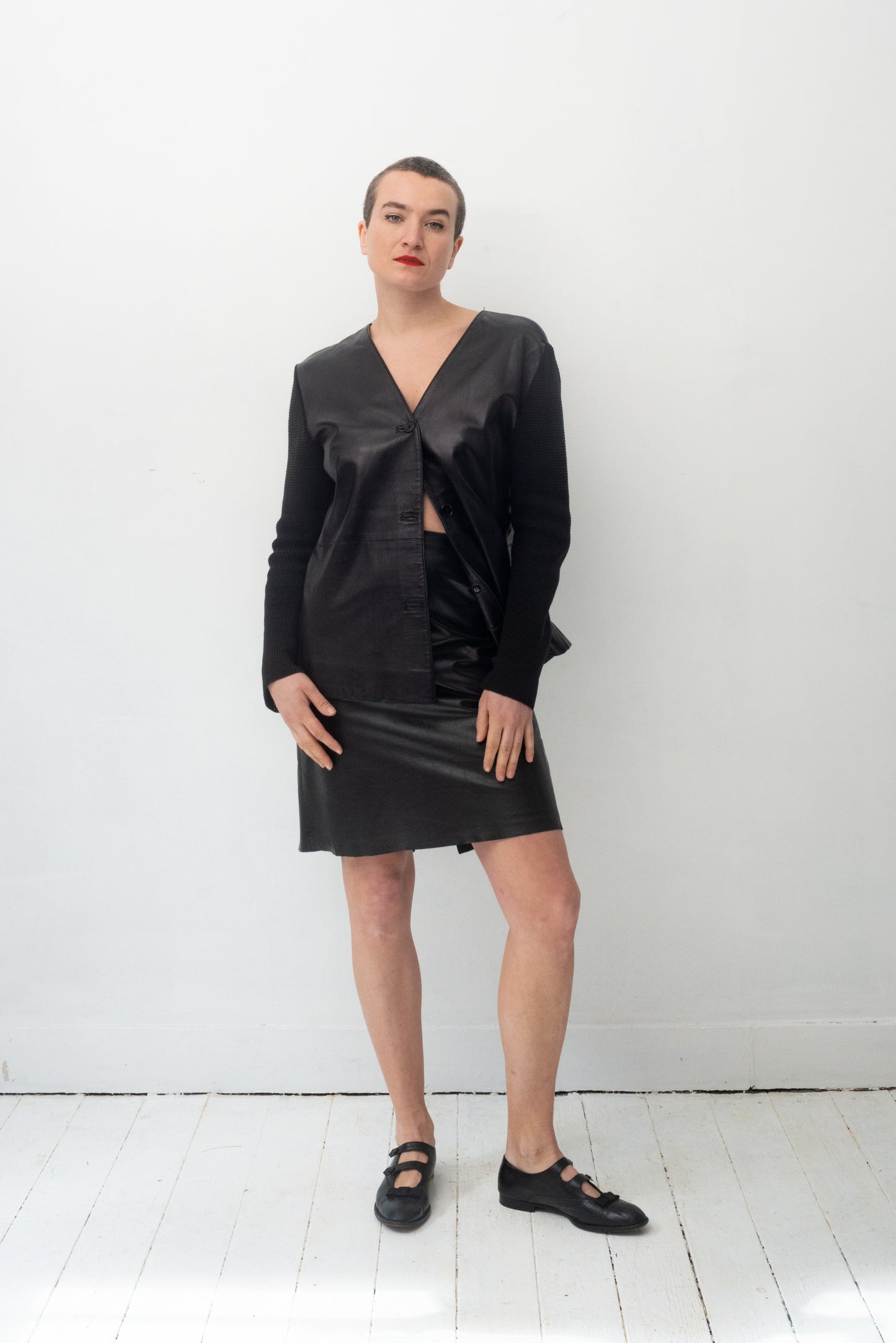 Gianfranco Ferre 90's leather jacket with knit sleeves and back