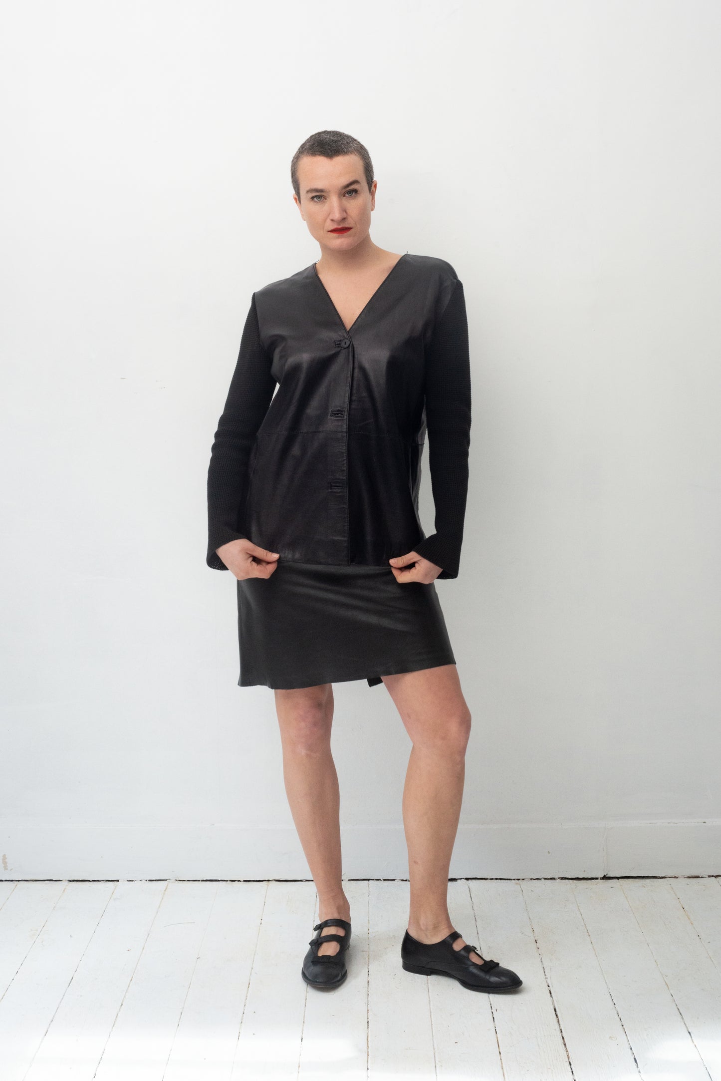 Gianfranco Ferre 90's leather jacket with knit sleeves and back
