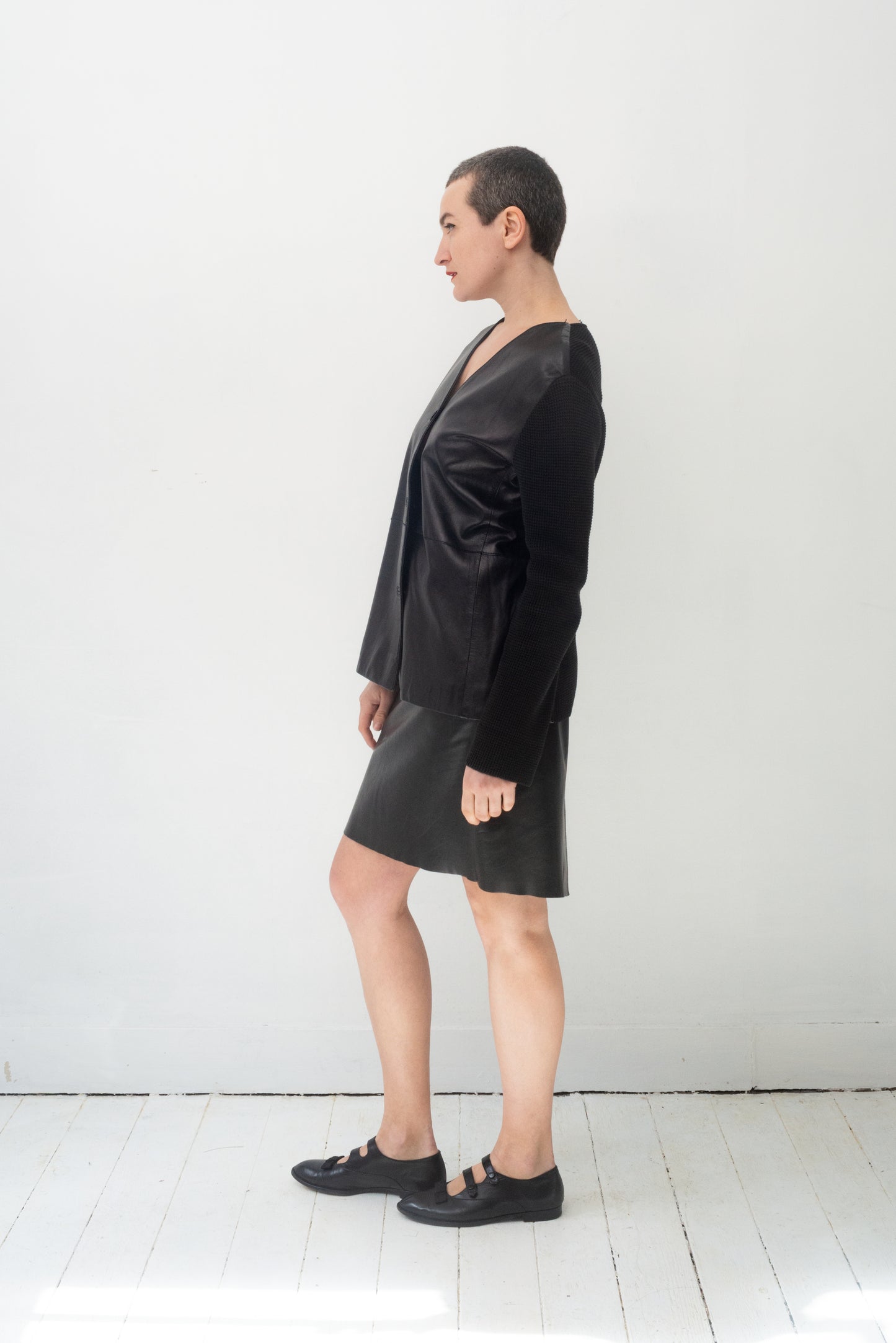 Gianfranco Ferre 90's leather jacket with knit sleeves and back