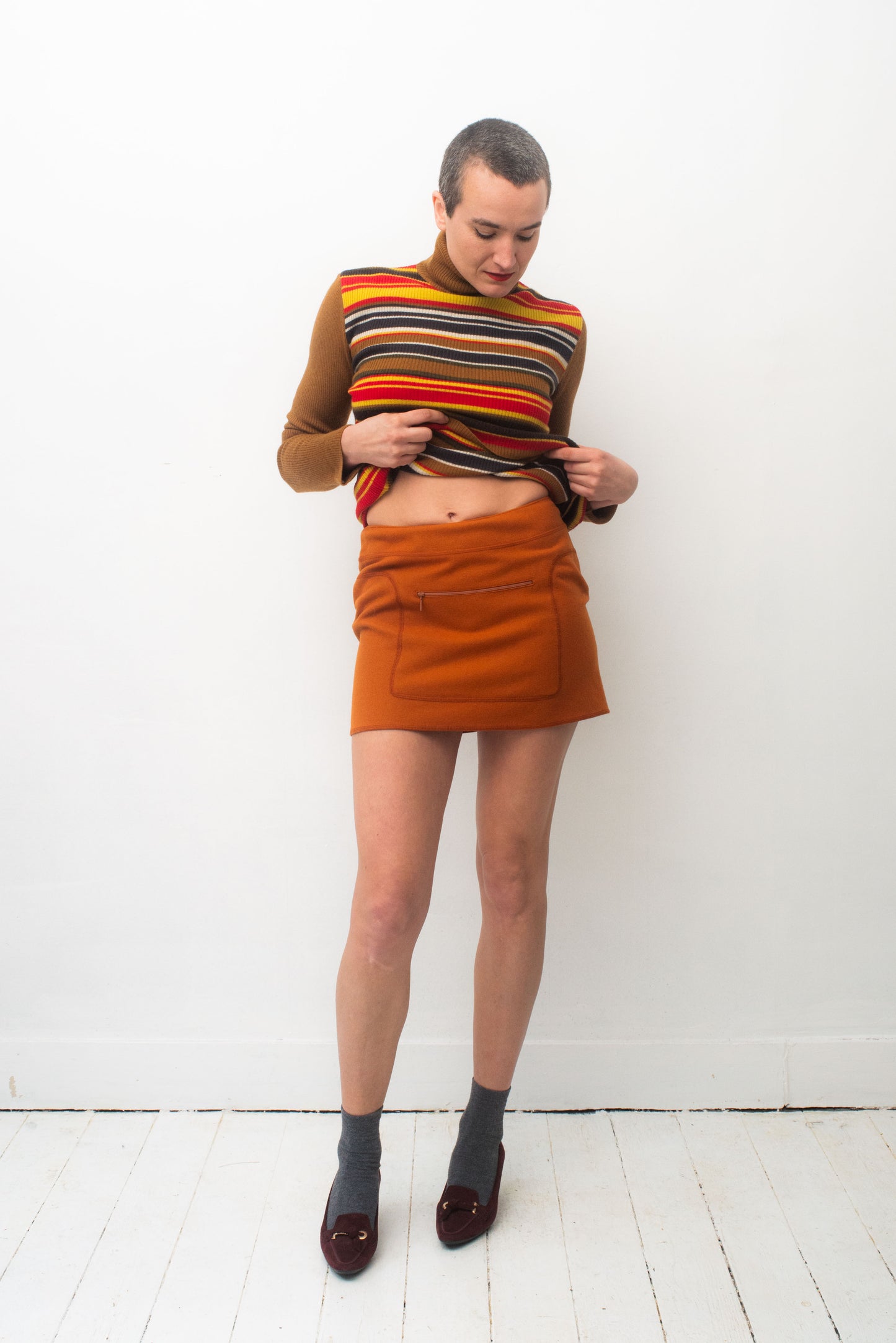 Miu Miu FW 1999 orange miniskirt with stitched in fanny pack