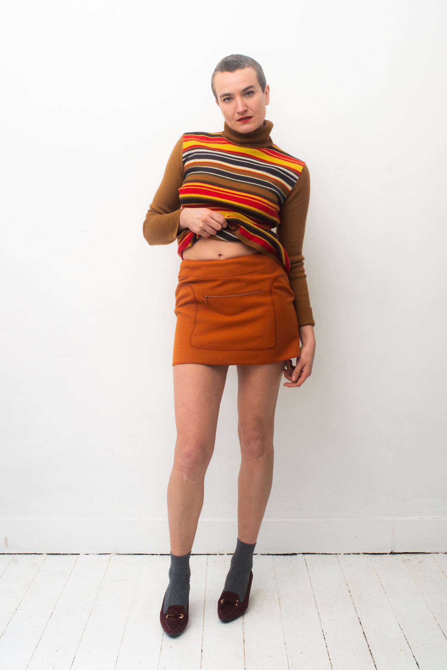 Miu Miu FW 1999 orange miniskirt with stitched in fanny pack