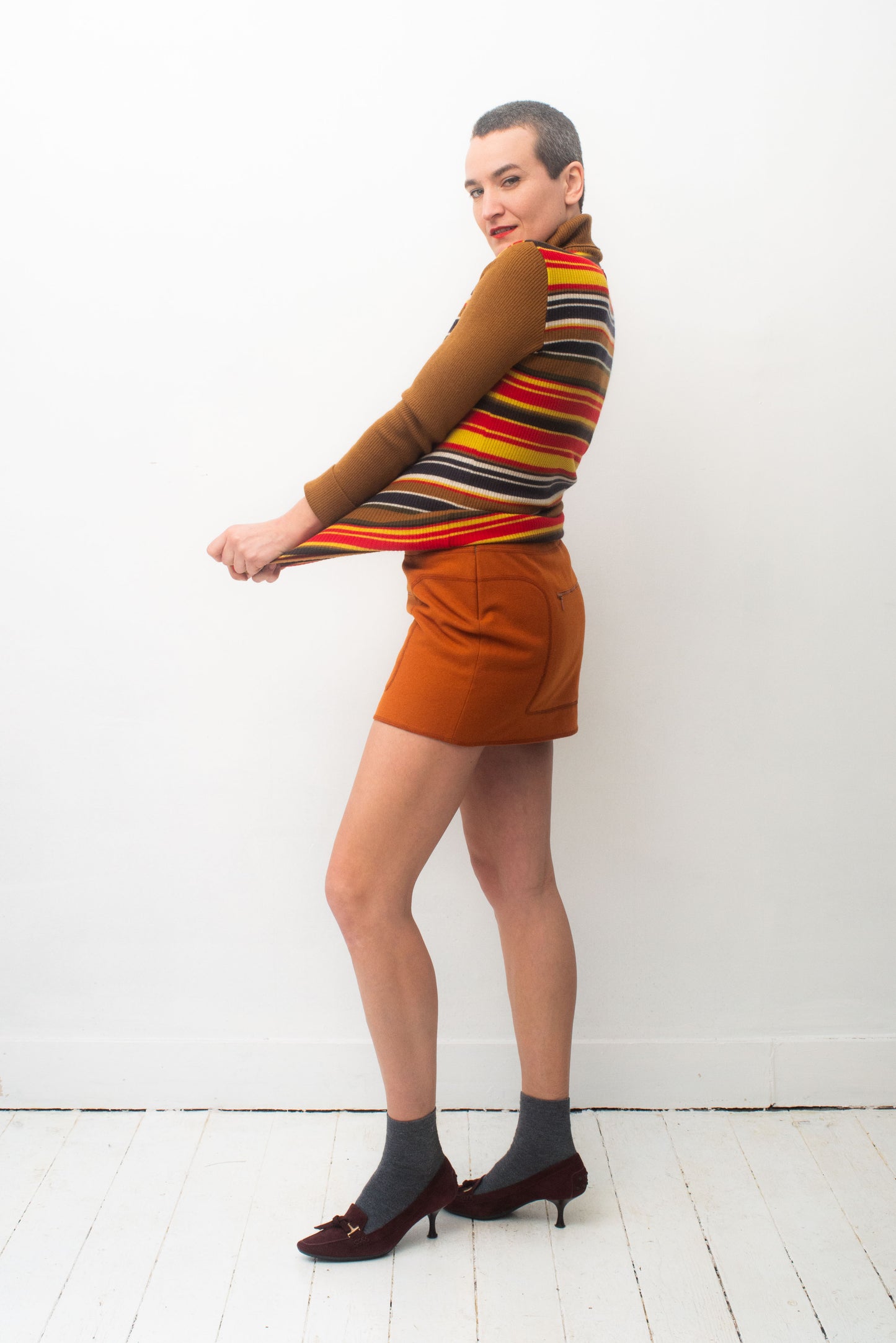 Miu Miu FW 1999 orange miniskirt with stitched in fanny pack