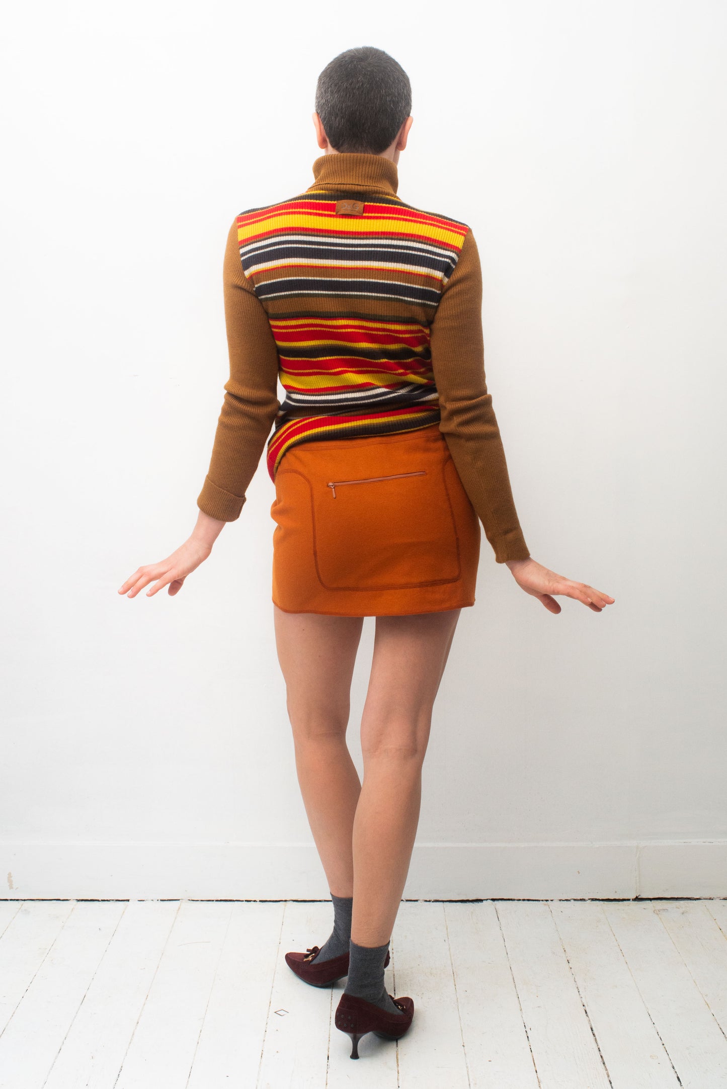 Miu Miu FW 1999 orange miniskirt with stitched in fanny pack