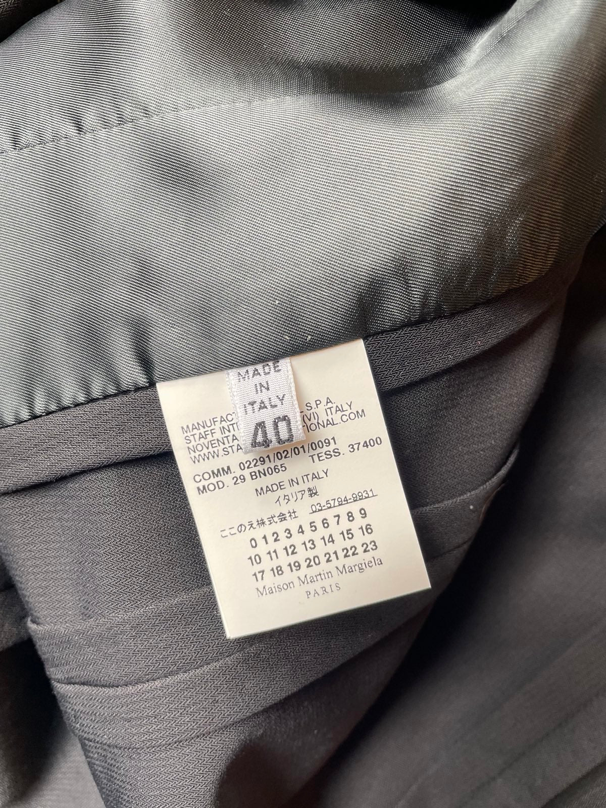 Maison Margiela black deconstructed padded shoulder cigarette jacket