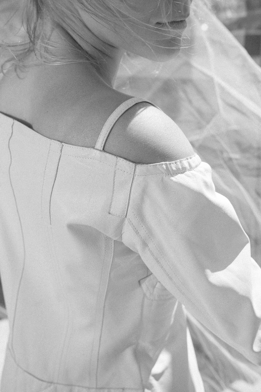 Costume National white leather top with bare shoulders
