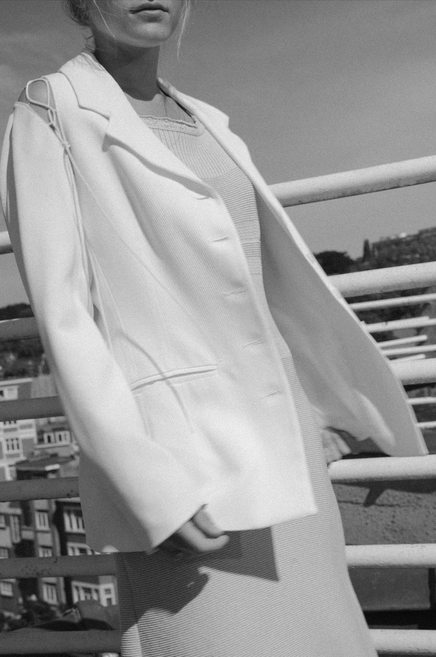 Puck & Hans 2000s white blazer with laced up shoulders