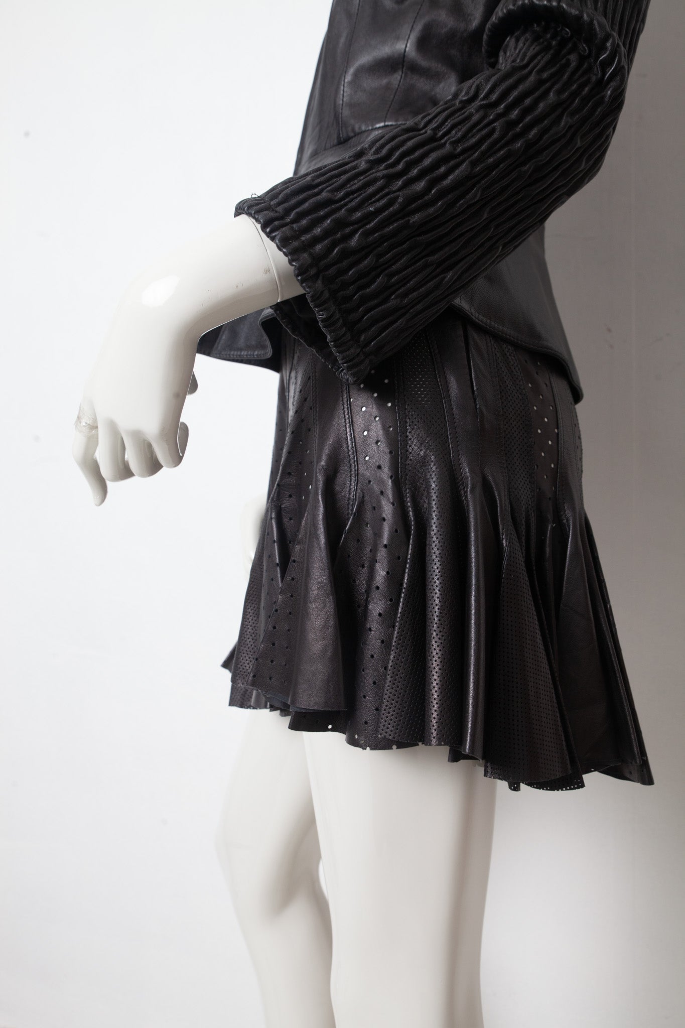 Alexander McQueen SS 2003 black perforated leather pleated miniskirt