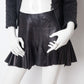 Alexander McQueen SS 2003 black perforated leather pleated miniskirt