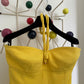 Claude Montana 80's yellow tube dress with swirling tube neck strap.