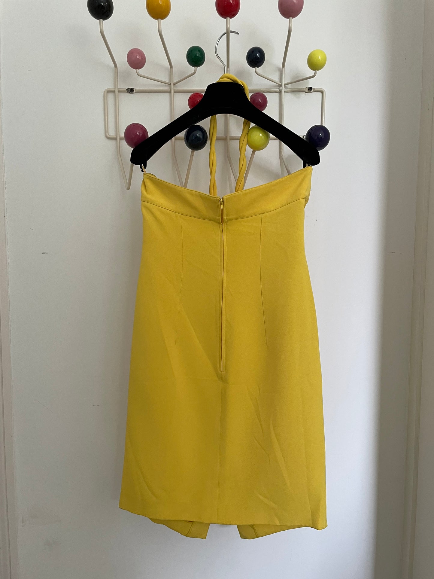 Claude Montana 80's yellow tube dress with swirling tube neck strap.