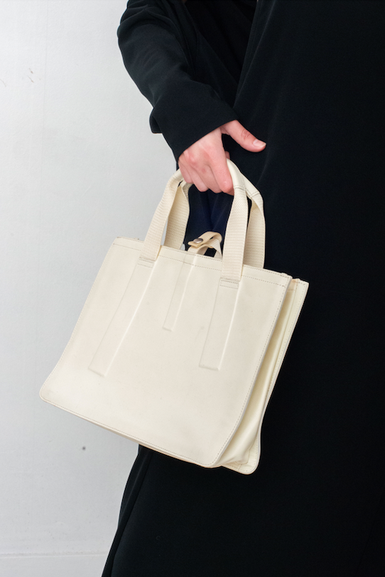 Issey Miyake eggshell rubber handbag