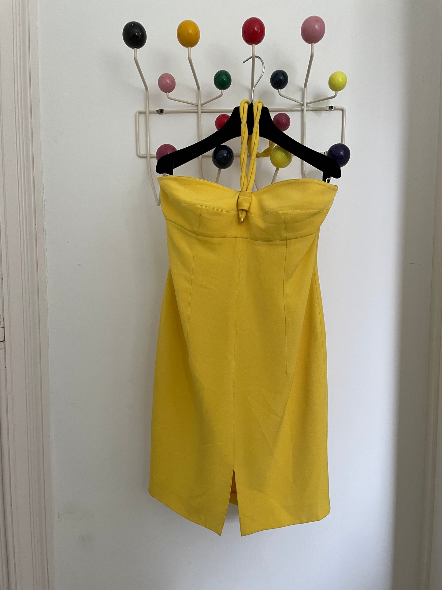 Claude Montana 80's yellow tube dress with swirling tube neck strap.