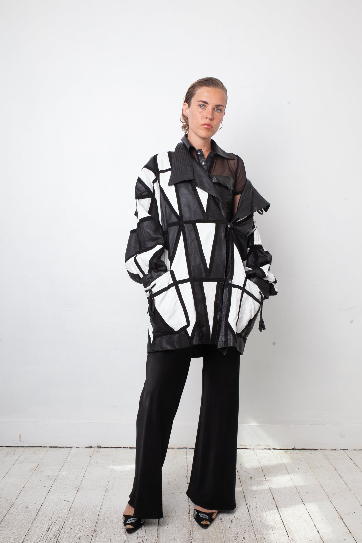 Yves Saint Laurent 80's black and white leather harlequin coat