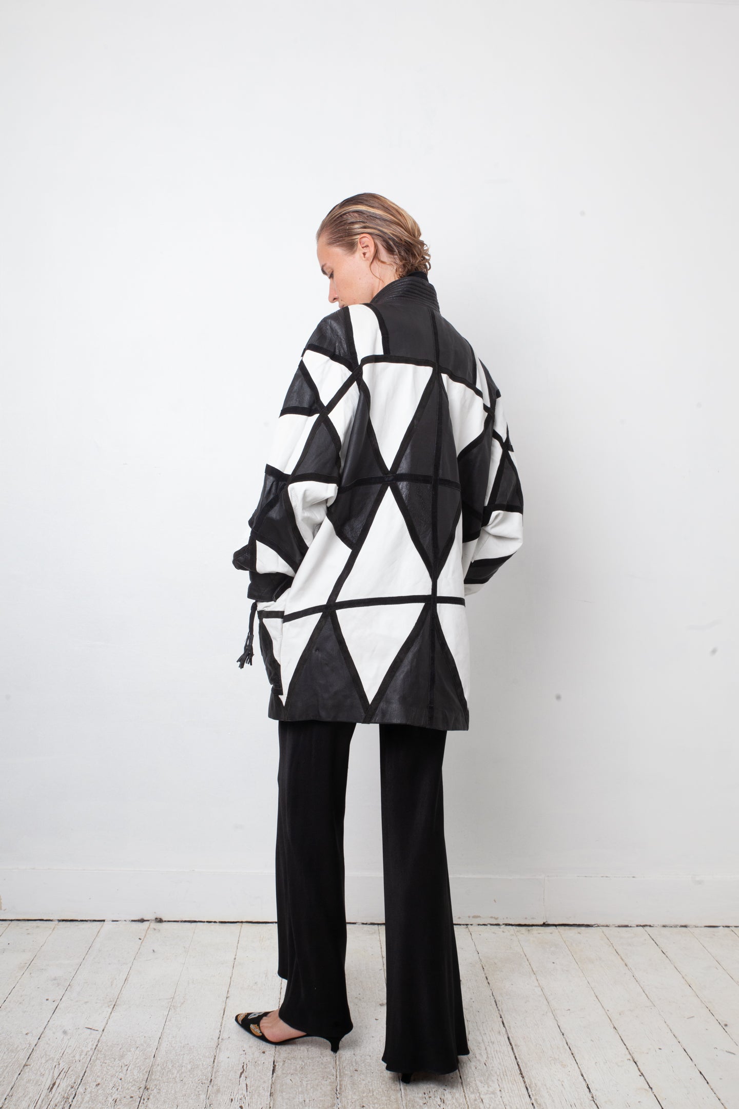 Yves Saint Laurent 80's black and white leather harlequin coat